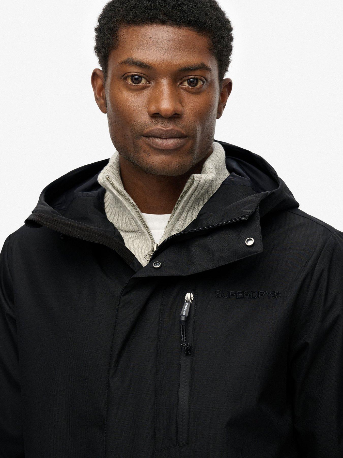 image of superdry-hooded-tech-fishtail-parka-black