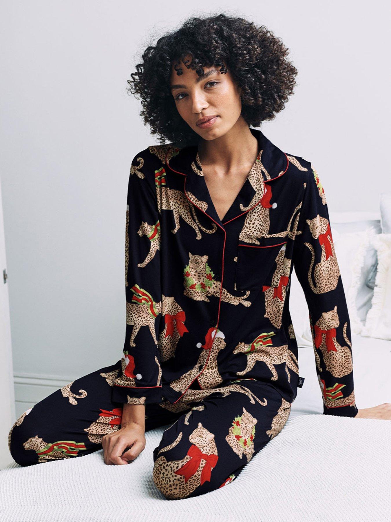  image of chelsea-peers-ladies-christmas-long-button-up-printed-pyjama-set-navy