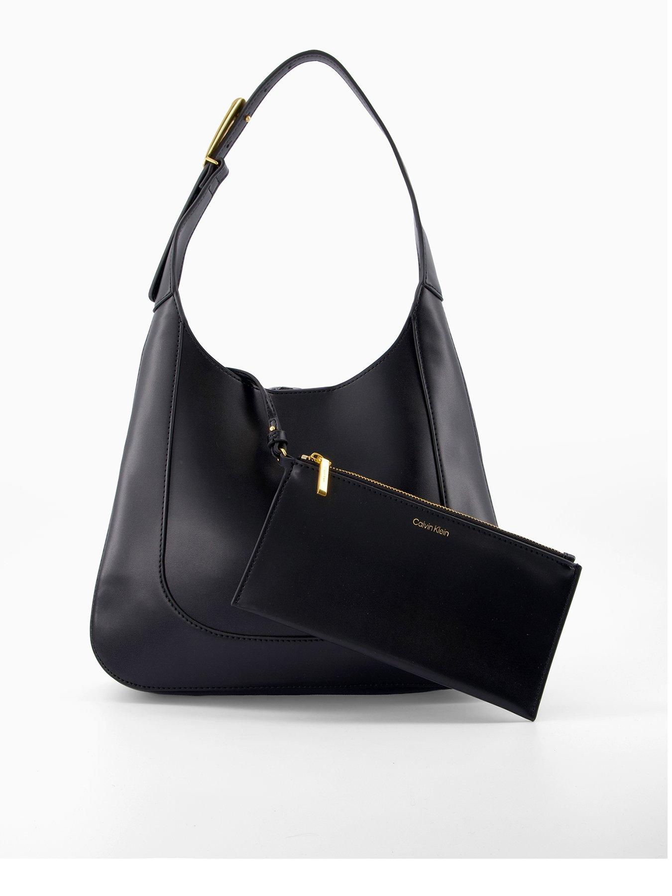 Image 1 of 5 of Calvin Klein Engraved Hardware Adjustable Strap Medium Bag - Black/Tumbled Deep Gold