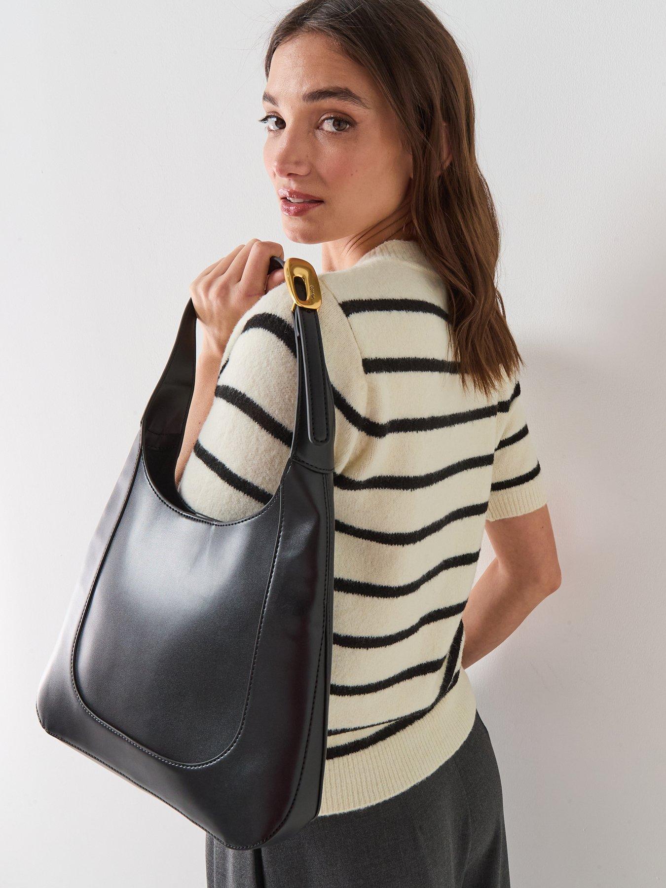 Image 2 of 5 of Calvin Klein Engraved Hardware Adjustable Strap Medium Bag - Black/Tumbled Deep Gold