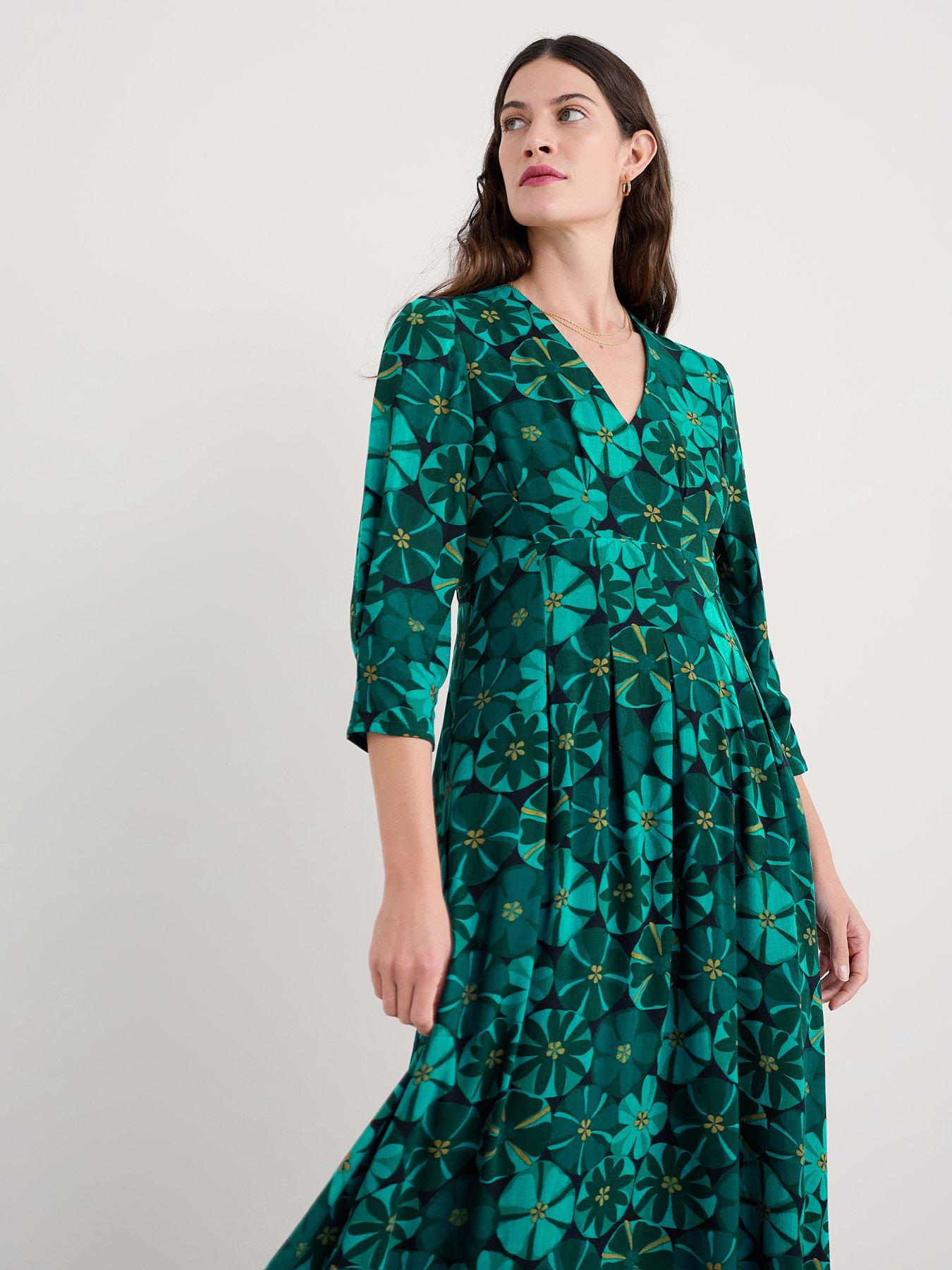 front image of seasalt-cornwall-etta-dress-handicraft-flowers-onyx-blue