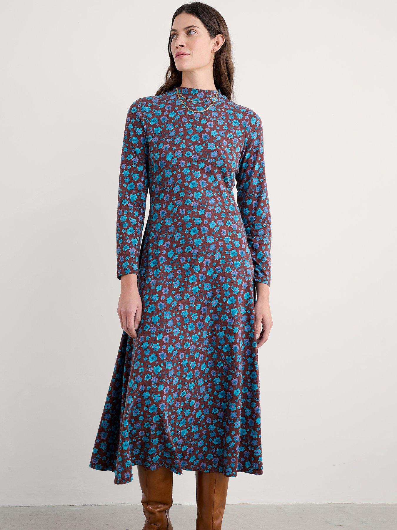 front image of seasalt-cornwall-st-merryn-dress-falling-flowers-dark-rye-green