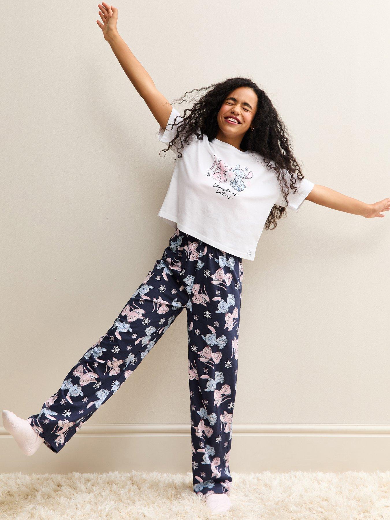 Image 1 of 5 of New Look 915 Girls Navy Disney Angel And Stitch T-Shirt And Trousers Christmas Pyjama Set - White