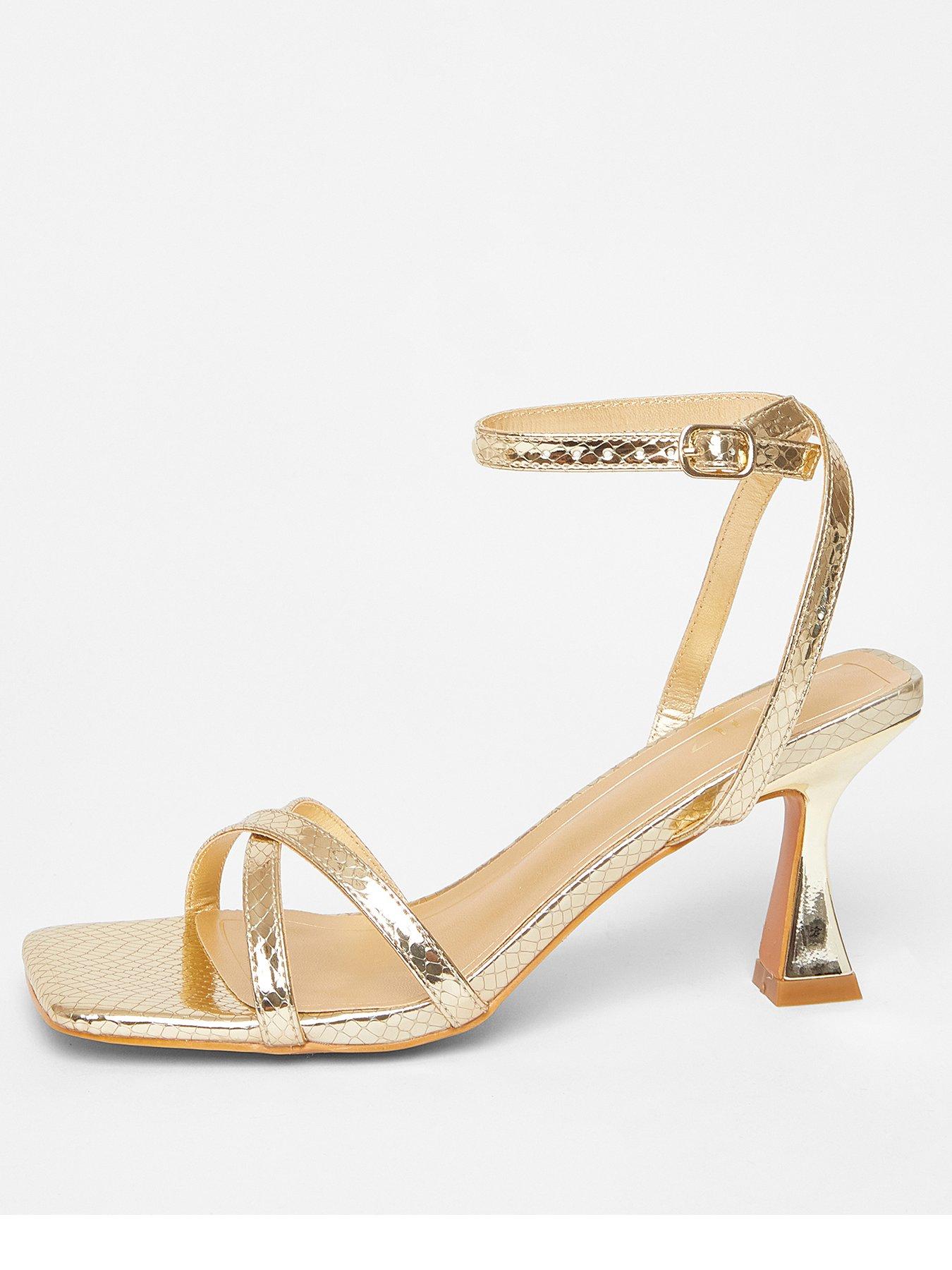 quiz-gold-cross-strap-flared-heel