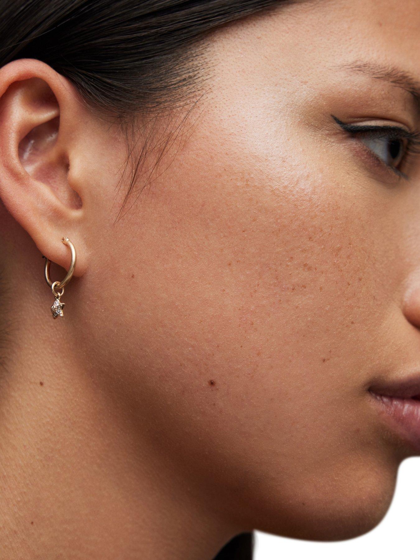  image of allsaints-ear-star-huggie-earrings