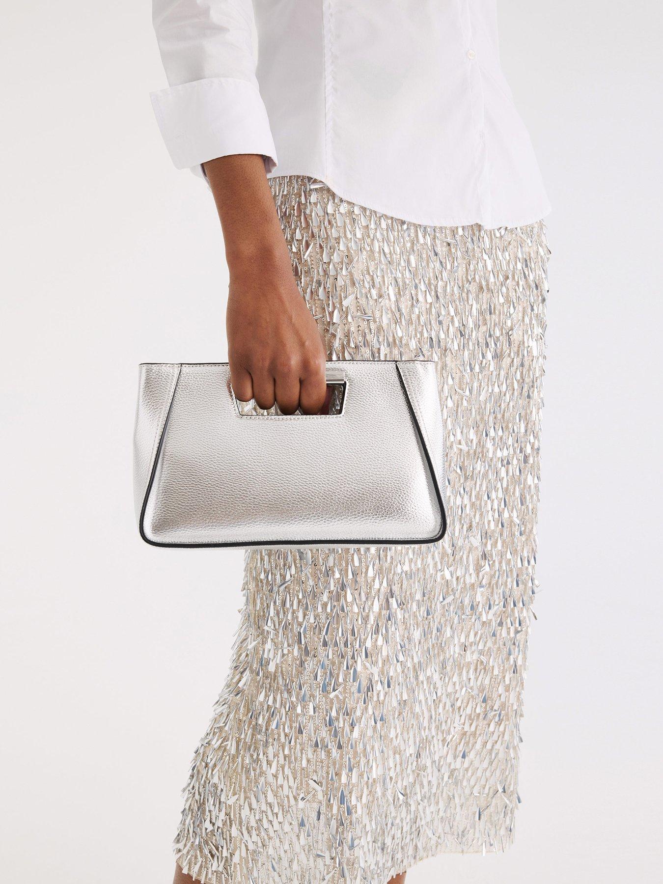 stillFront image of fiorelli-lola-hard-handle-clutch-bag-silver