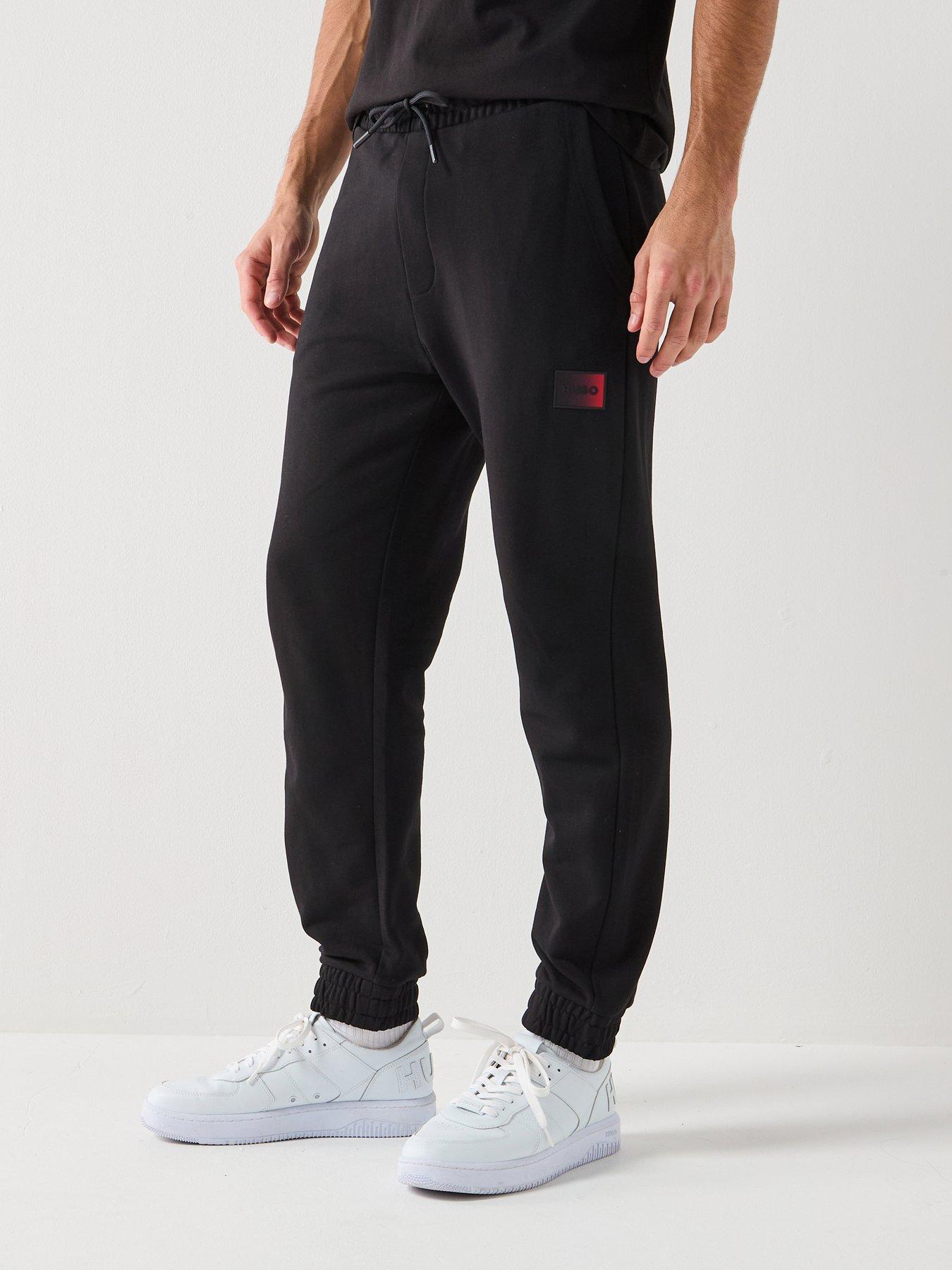 front image of hugo-danopan-gradient-badge-logo-joggers-black