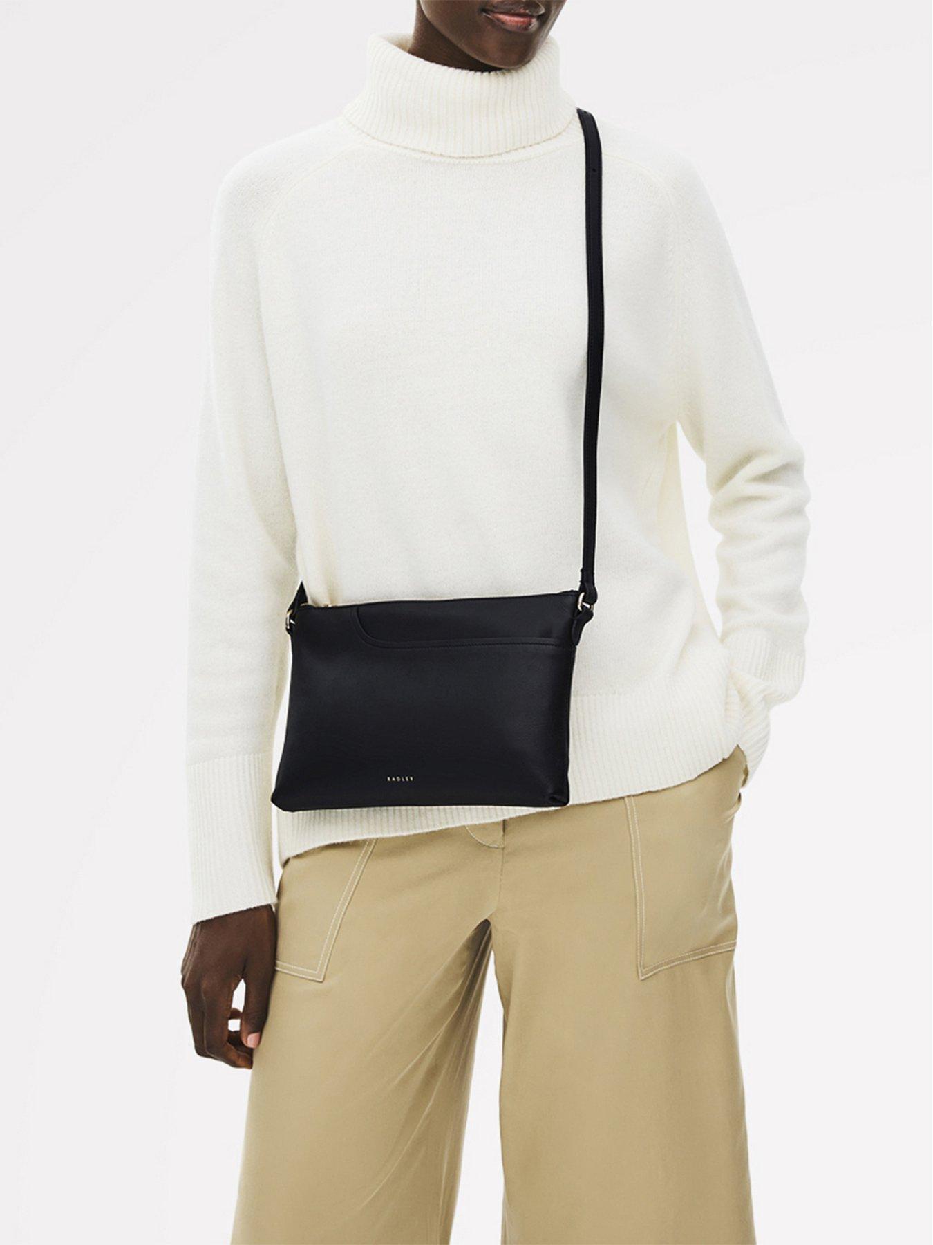 front image of radley-pockets-medium-leather-ziptop-crossbody-bag-black