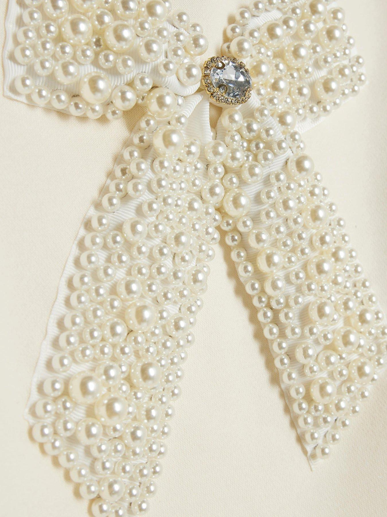  image of river-island-older-girls-bow-ruffle-sleeve-sweatshirt-cream