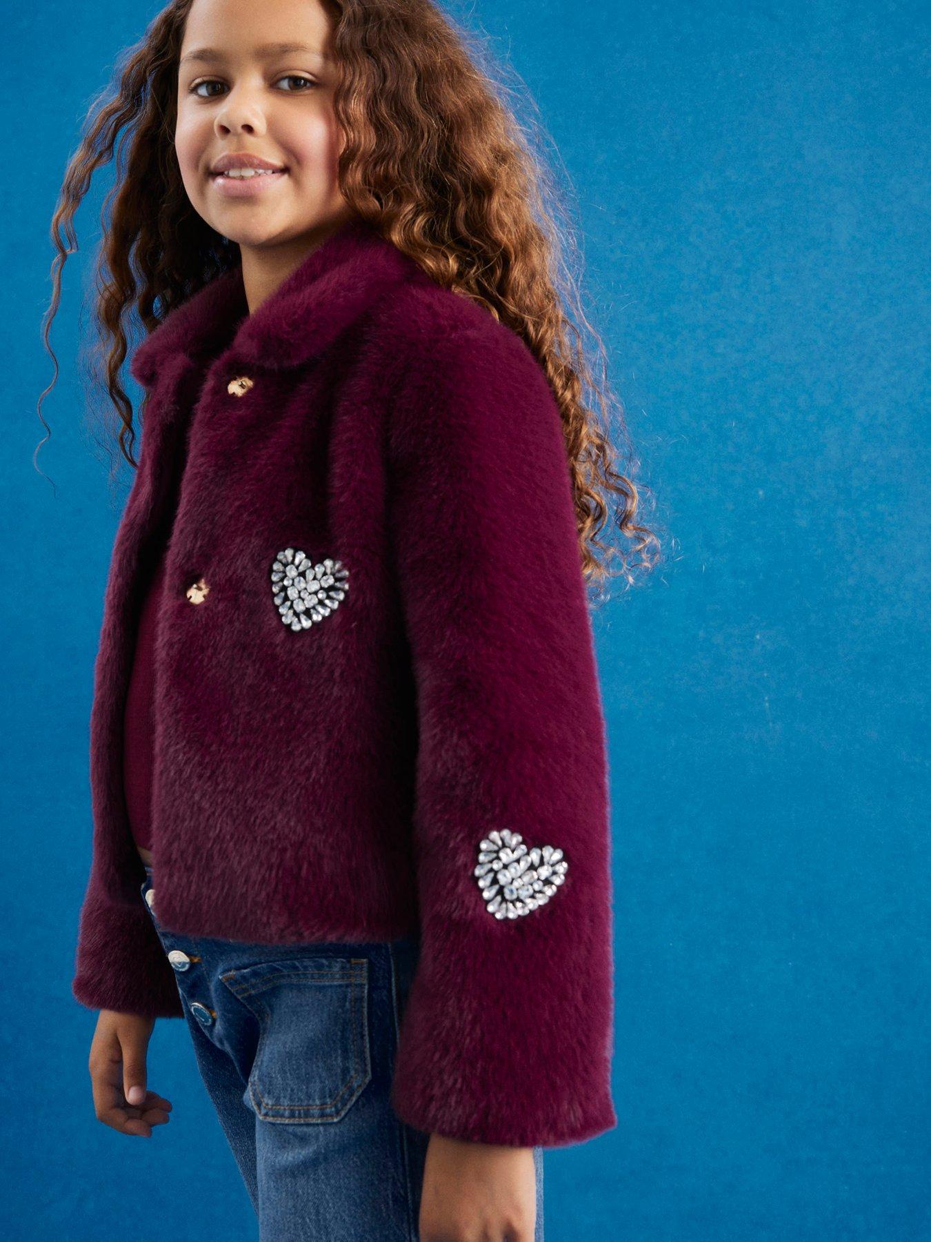 Image 1 of 5 of River Island Older Girls Embellished Faux Fur Heart Jacket - Dark Red