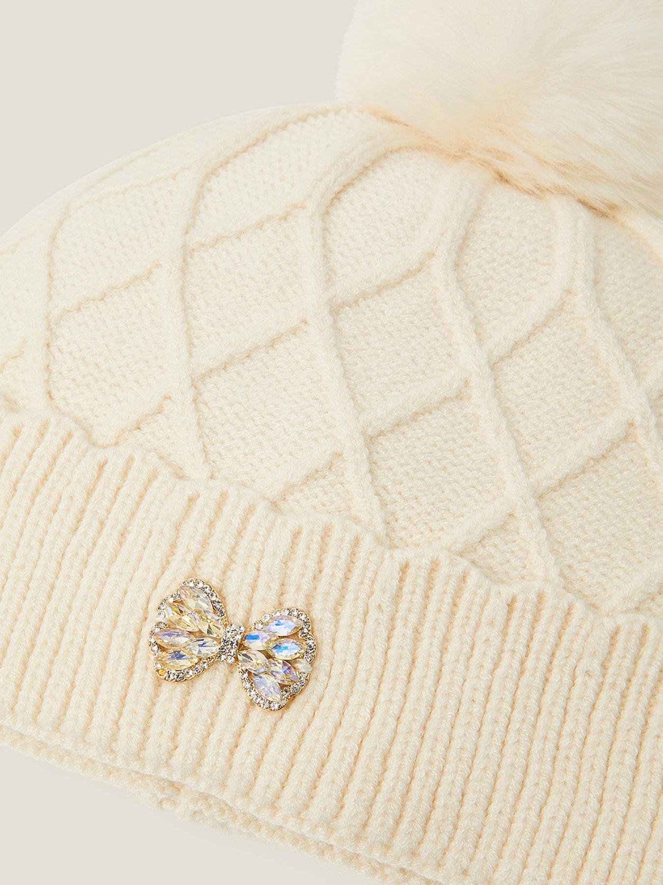  image of monsoon-girls-criss-cross-pom-hat-light-cream