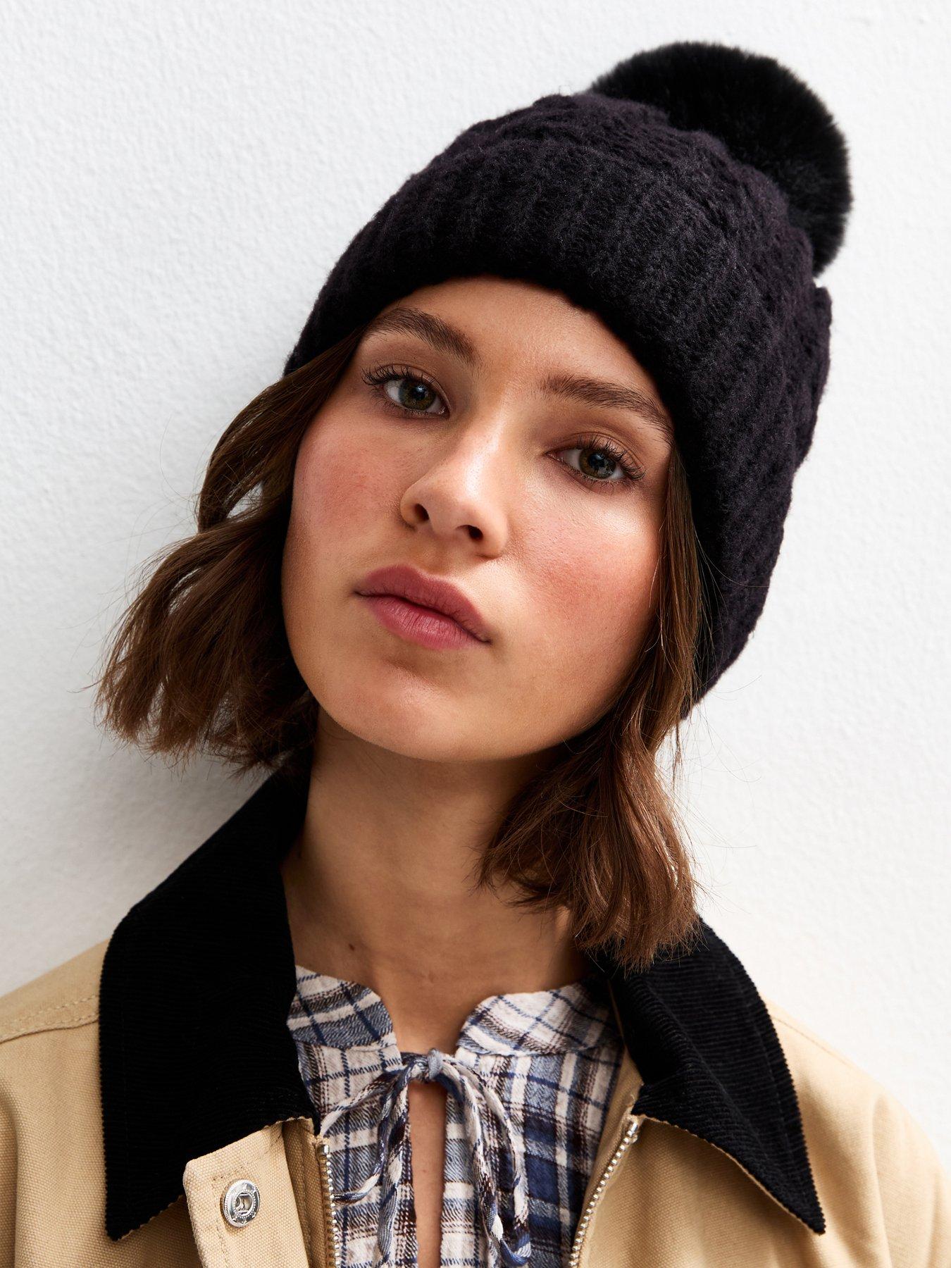  image of new-look-black-cable-knit-faux-fur-pom-pom-bobble-hat