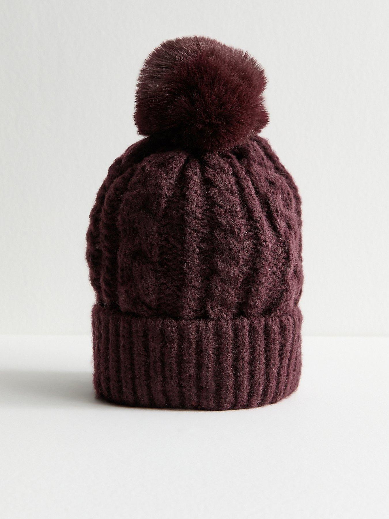 Image 1 of 3 of New Look Dark Burgundy Cable Knit Faux Fur Pom Pom Bobble Hat
