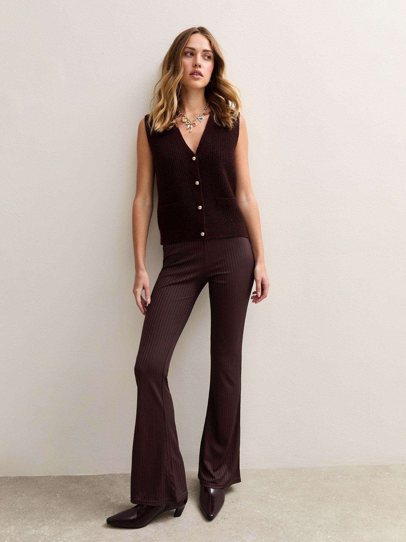  image of new-look-ribbed-jersey-flared-trousers-dark-red