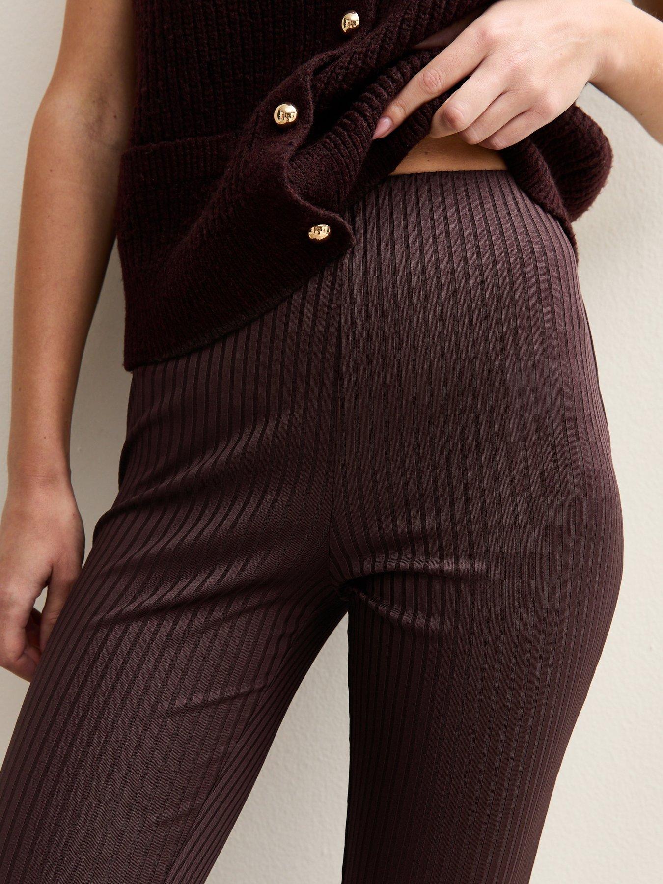  image of new-look-ribbed-jersey-flared-trousers-dark-red