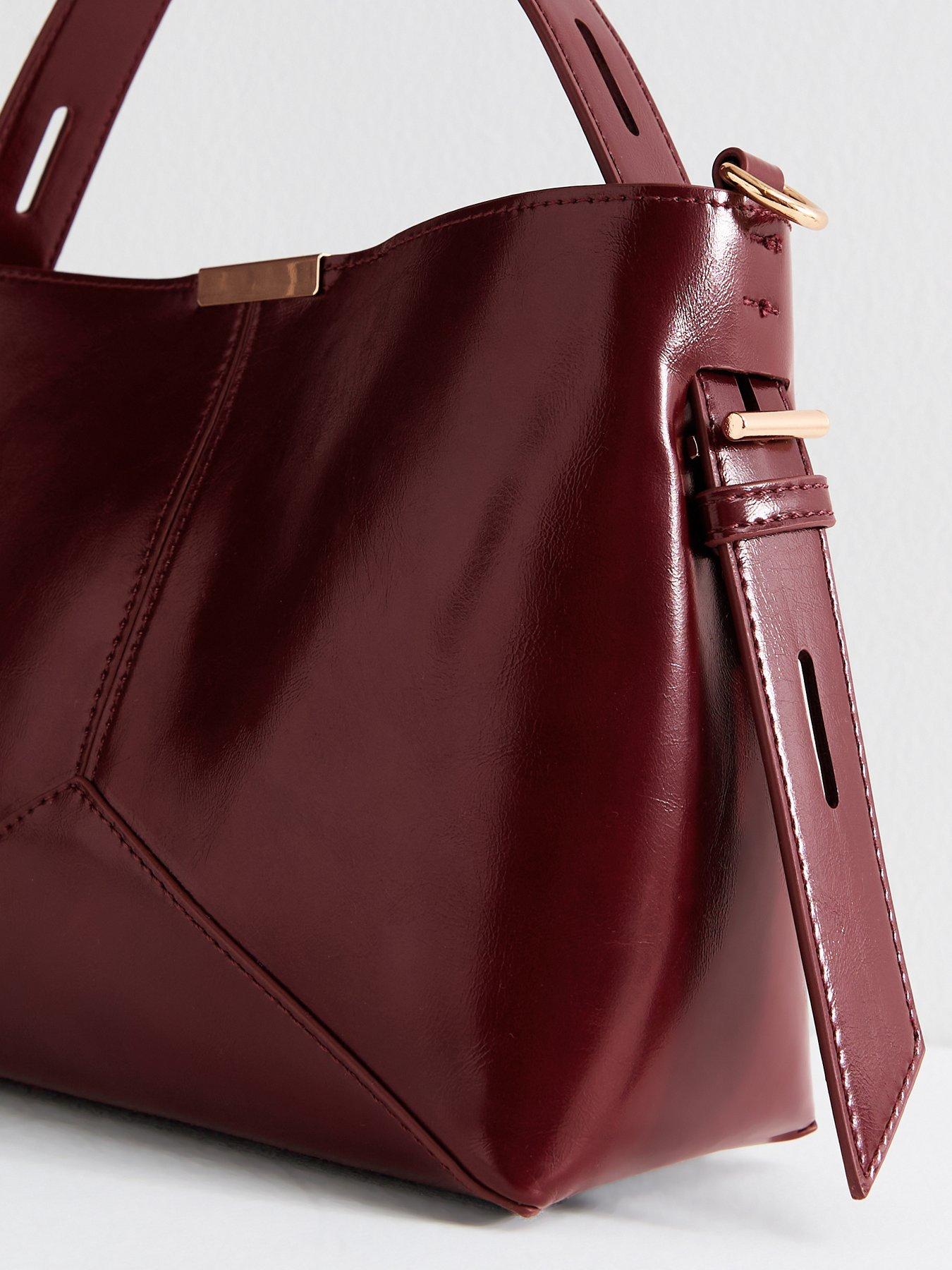 Image 4 of 5 of New Look Dark Burgundy High Shine Panelled Bucket Bag