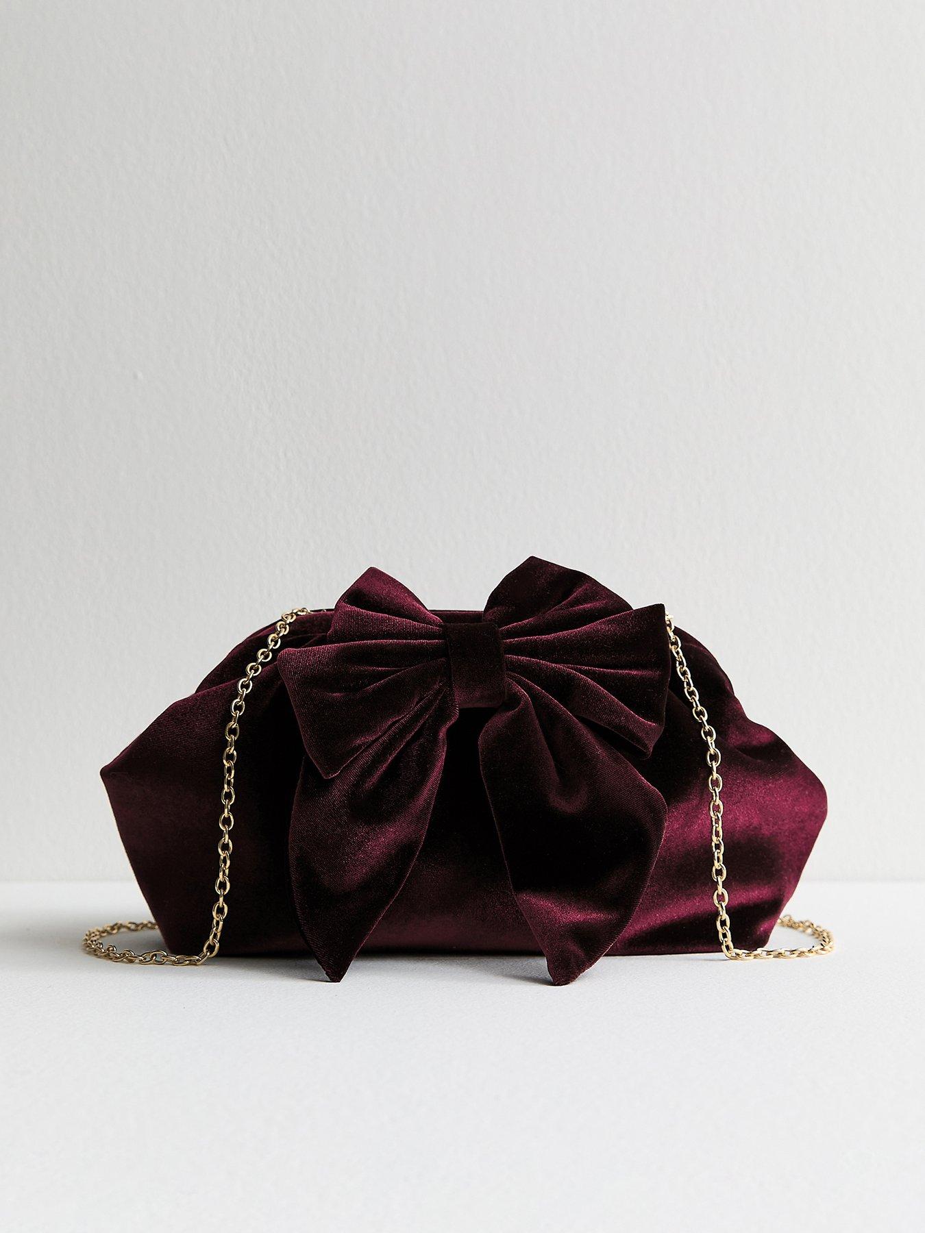stillFront image of new-look-bow-velvet-slouch-clutch-bag-purple