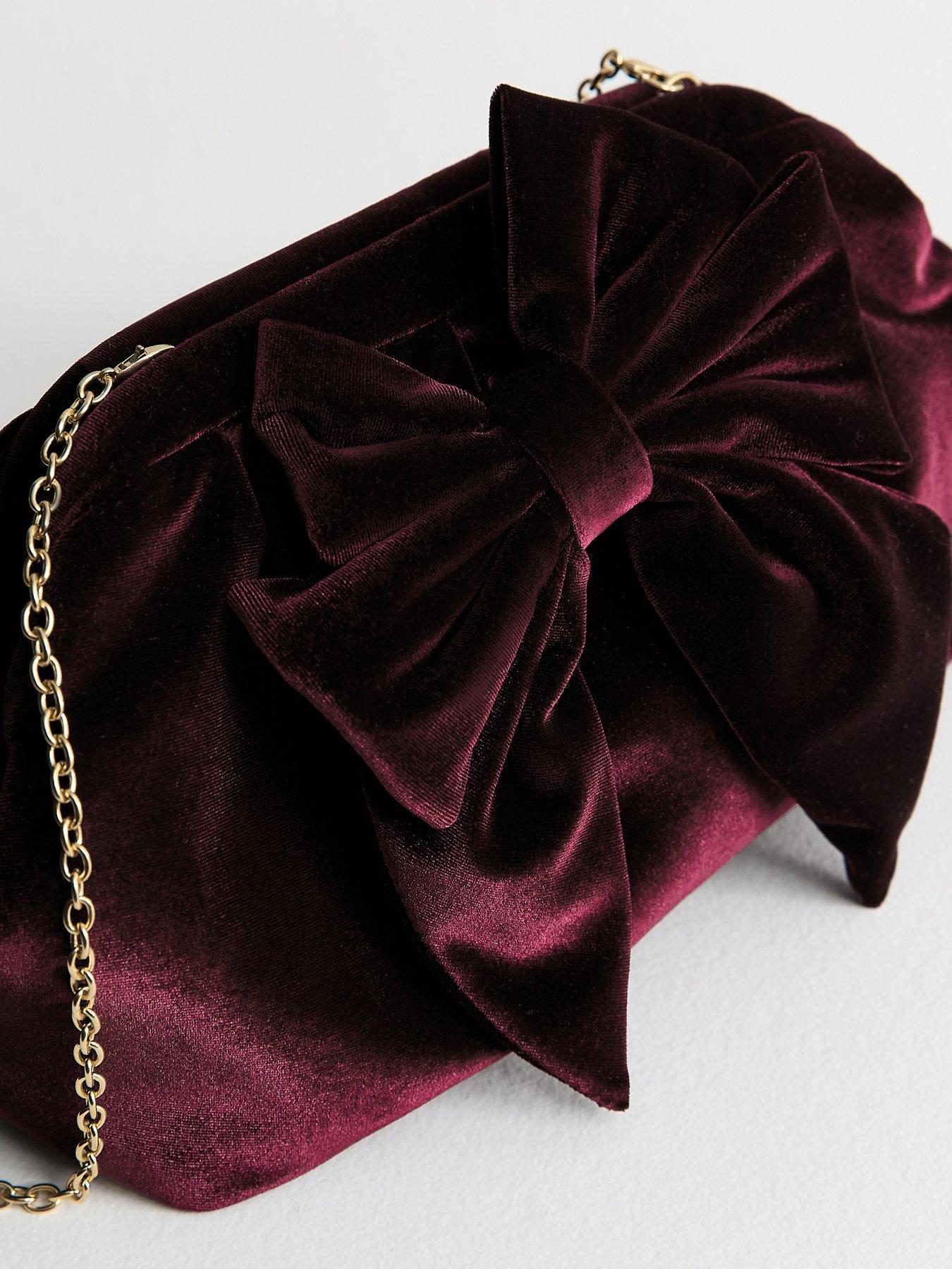  image of new-look-bow-velvet-slouch-clutch-bag-purple