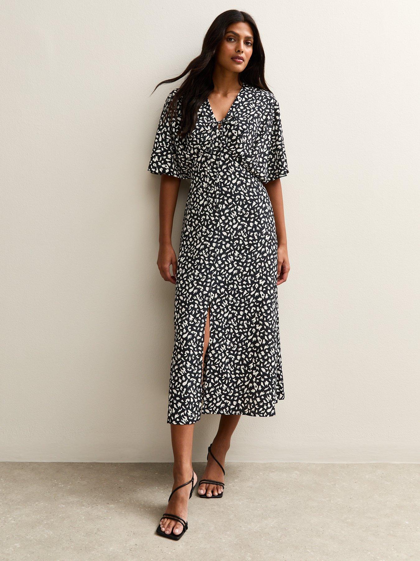 Image 1 of 5 of New Look Black Animal Print Batwing Sleeve Midi Dress