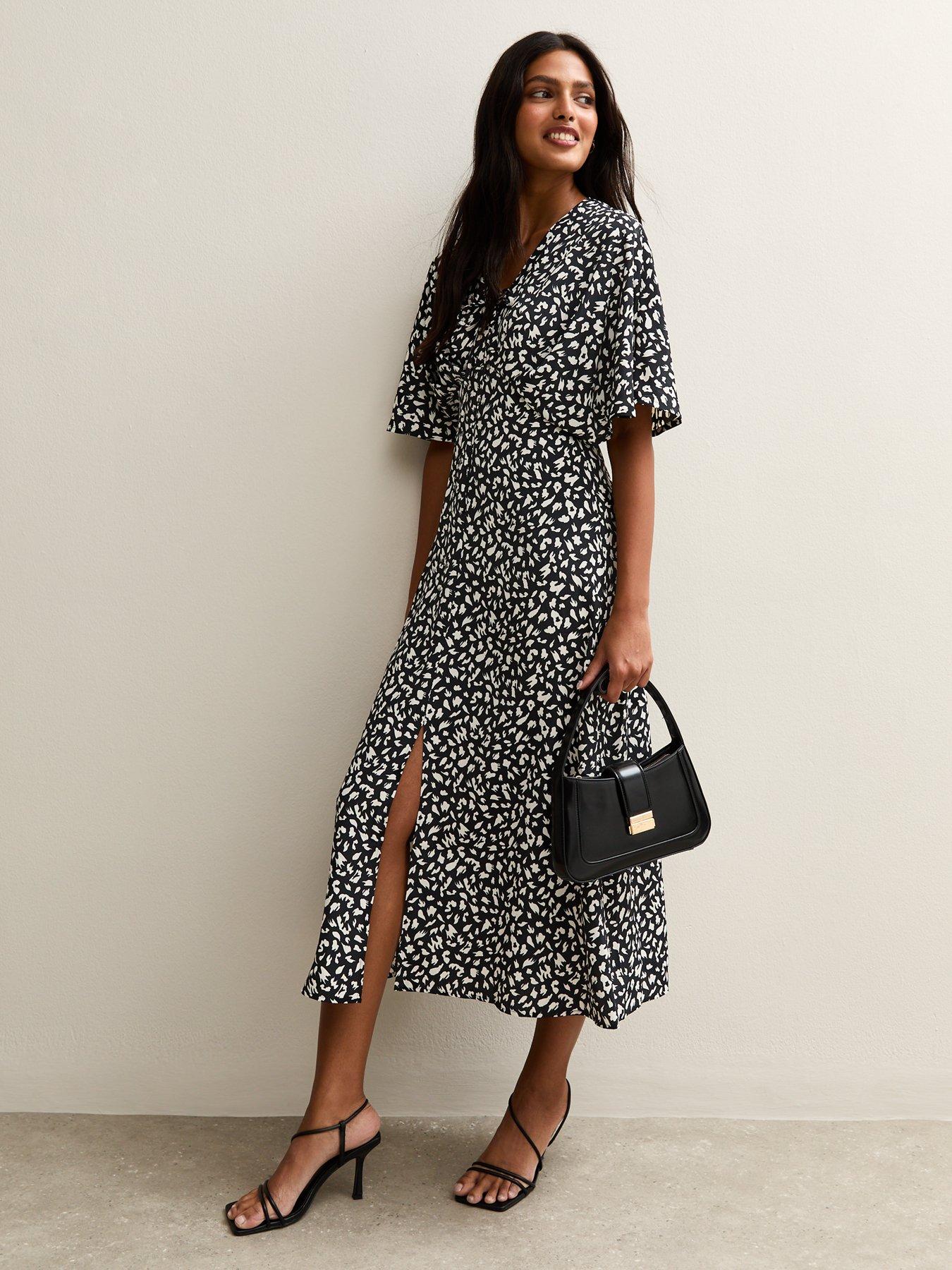 Image 3 of 5 of New Look Black Animal Print Batwing Sleeve Midi Dress