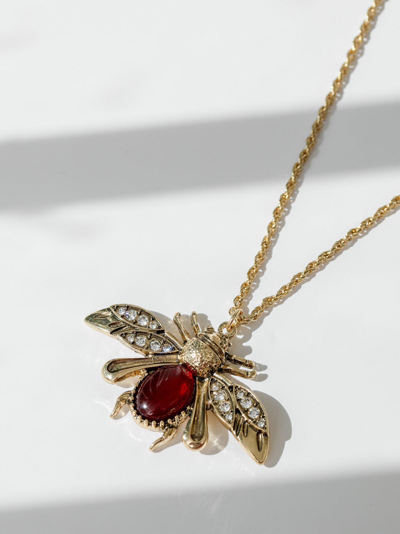 Image 4 of 4 of Mood GOLD TWISTED ROPE INSECT LONG PENDANT