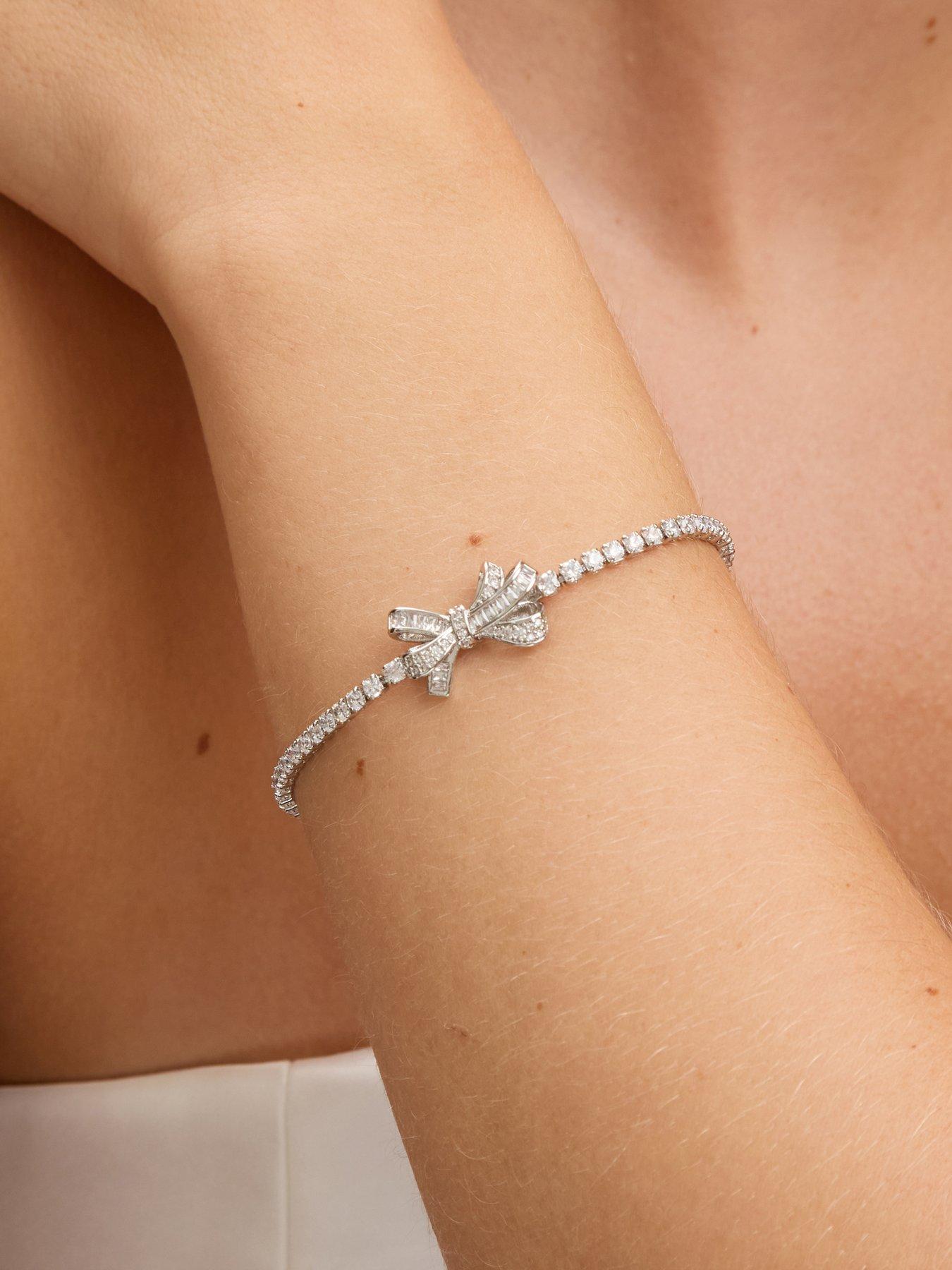  image of jon-richard-rhodium-plated-cubic-zirconia-bow-tennis-bracelet