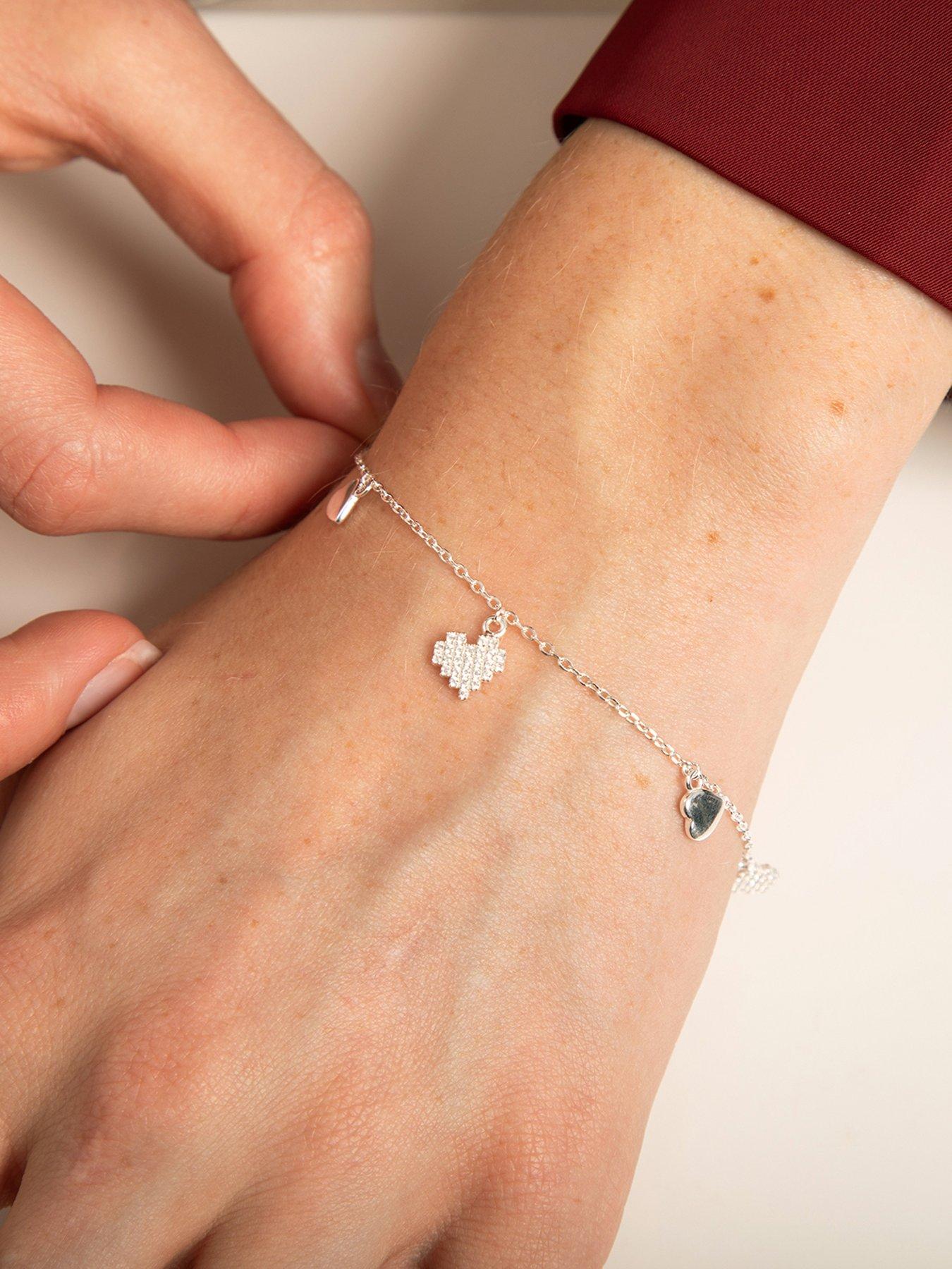  image of the-love-collection-sterling-silver-pixelated-heart-cz-bracelet