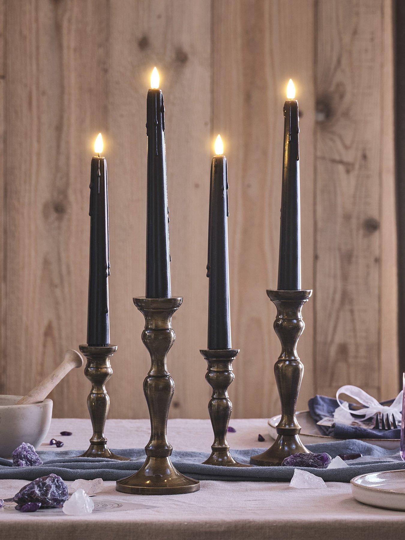 lights4fun-4-truglow-black-dripping-wax-led-taper-candles-with-remote-control