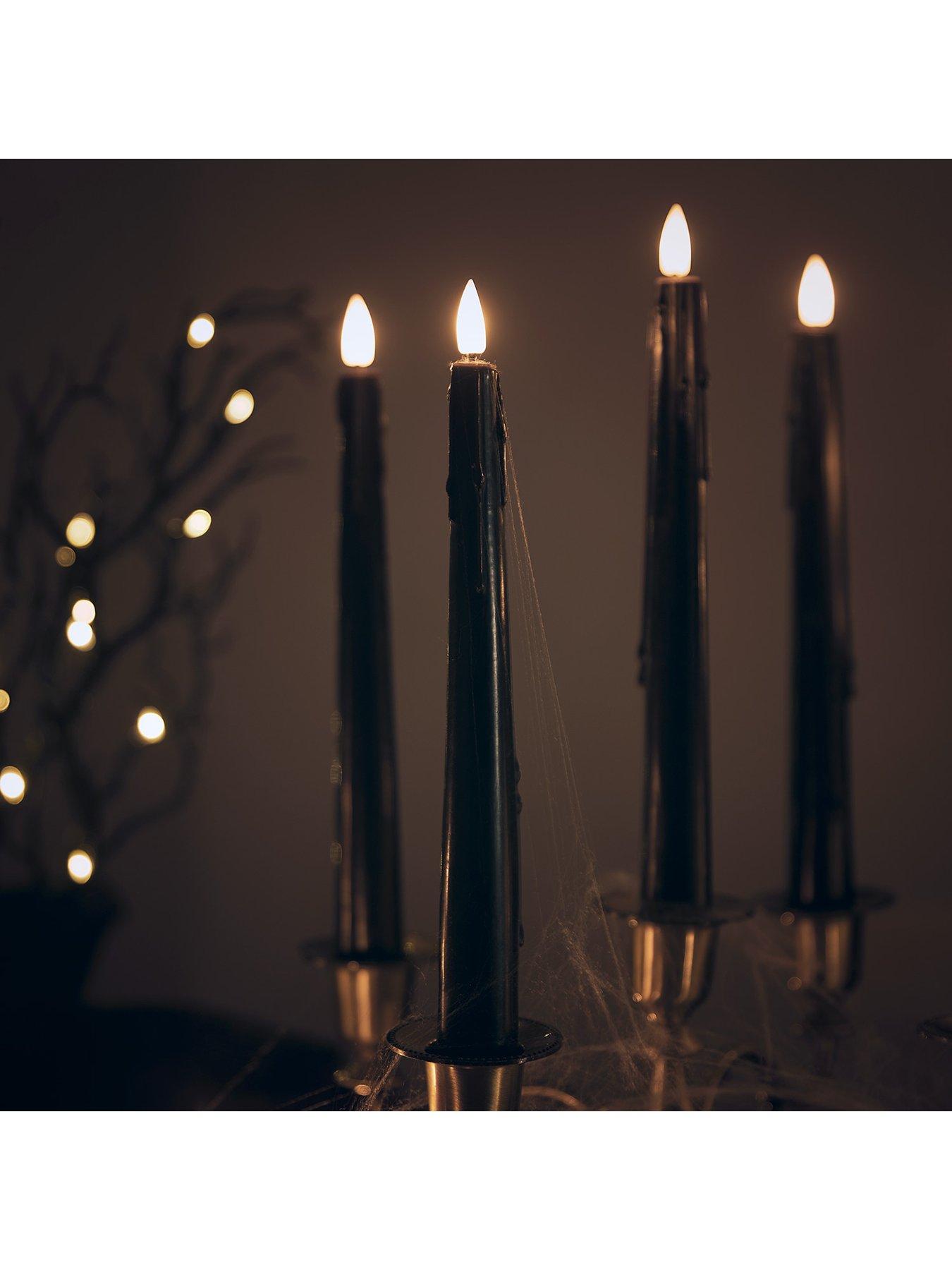 Image 3 of 3 of Lights4Fun 4 TruGlow Black Dripping Wax LED Taper Candles With Remote Control