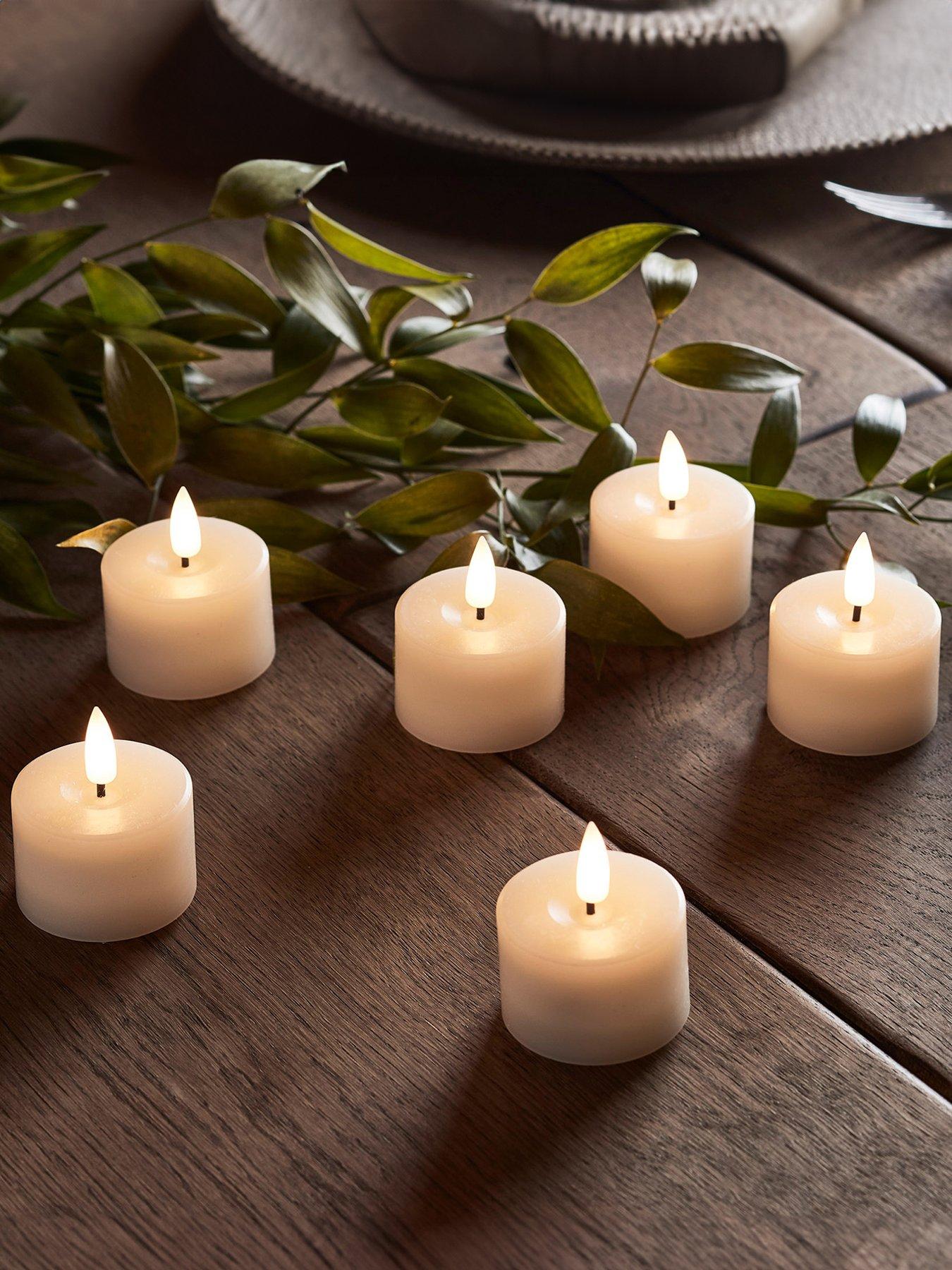 lights4fun-6-ivory-truglow-led-mini-votive-candles
