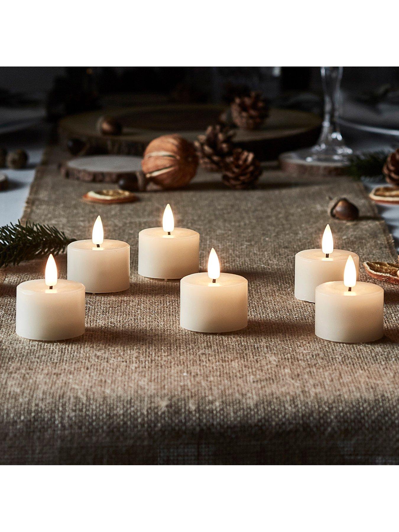  image of lights4fun-6-ivory-truglow-led-mini-votive-candles
