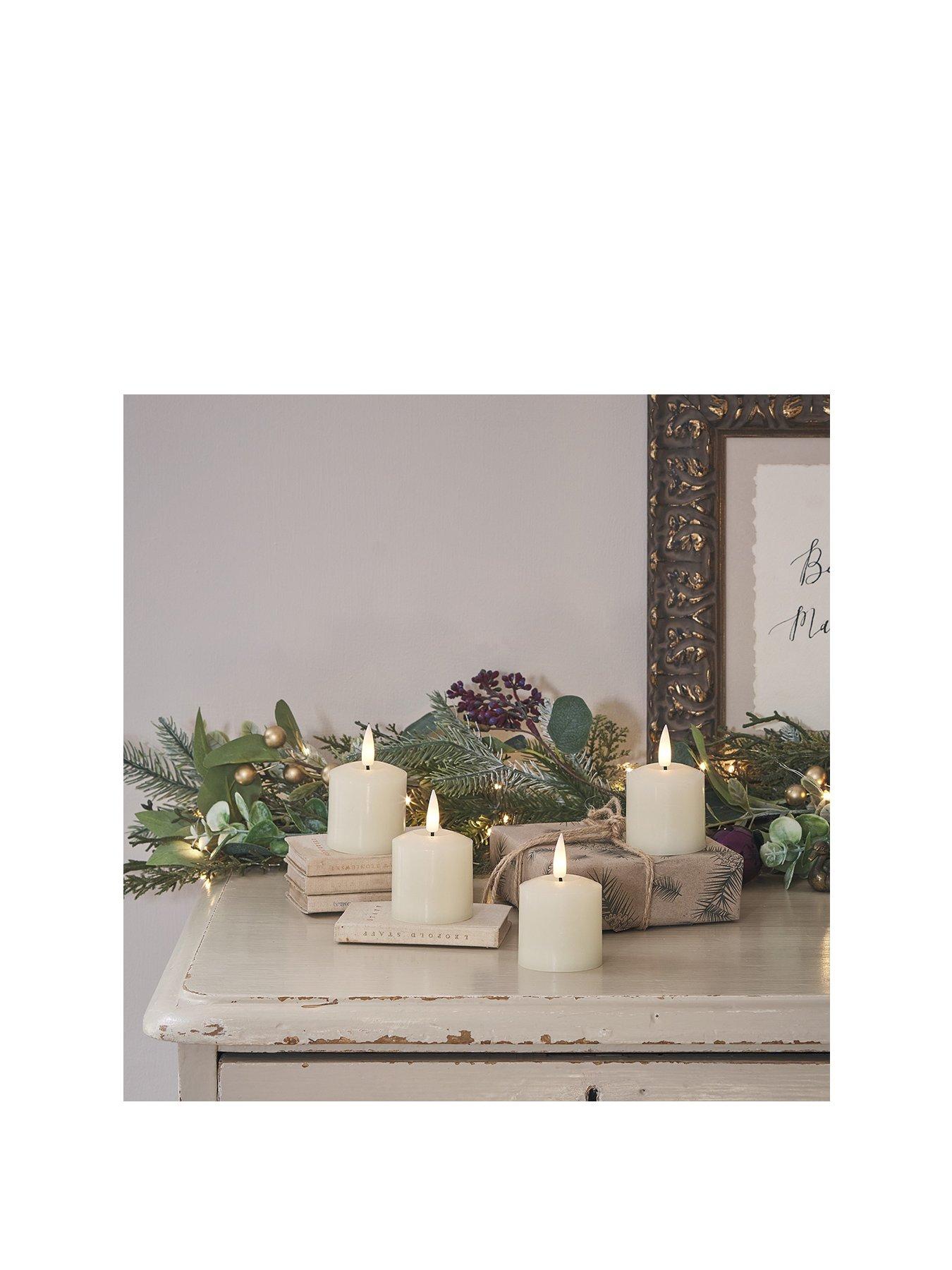  image of lights4fun-4-truglow-ivory-led-votive-candles