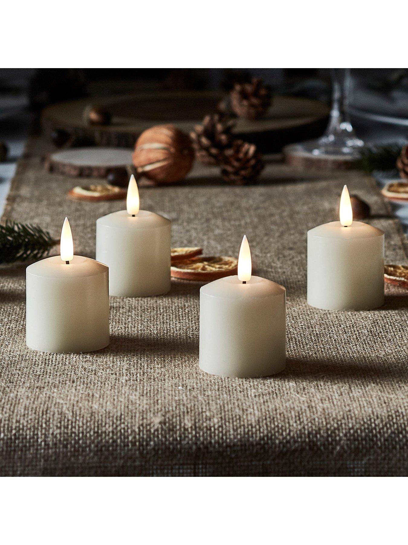  image of lights4fun-4-truglow-ivory-led-votive-candles