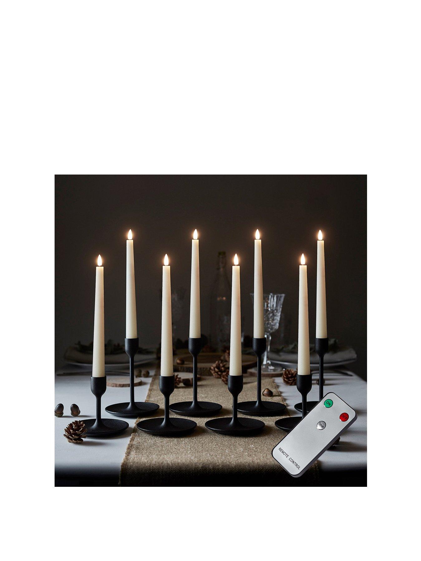  image of lights4fun-8-truglow-ivory-led-taper-candles-with-remote-control