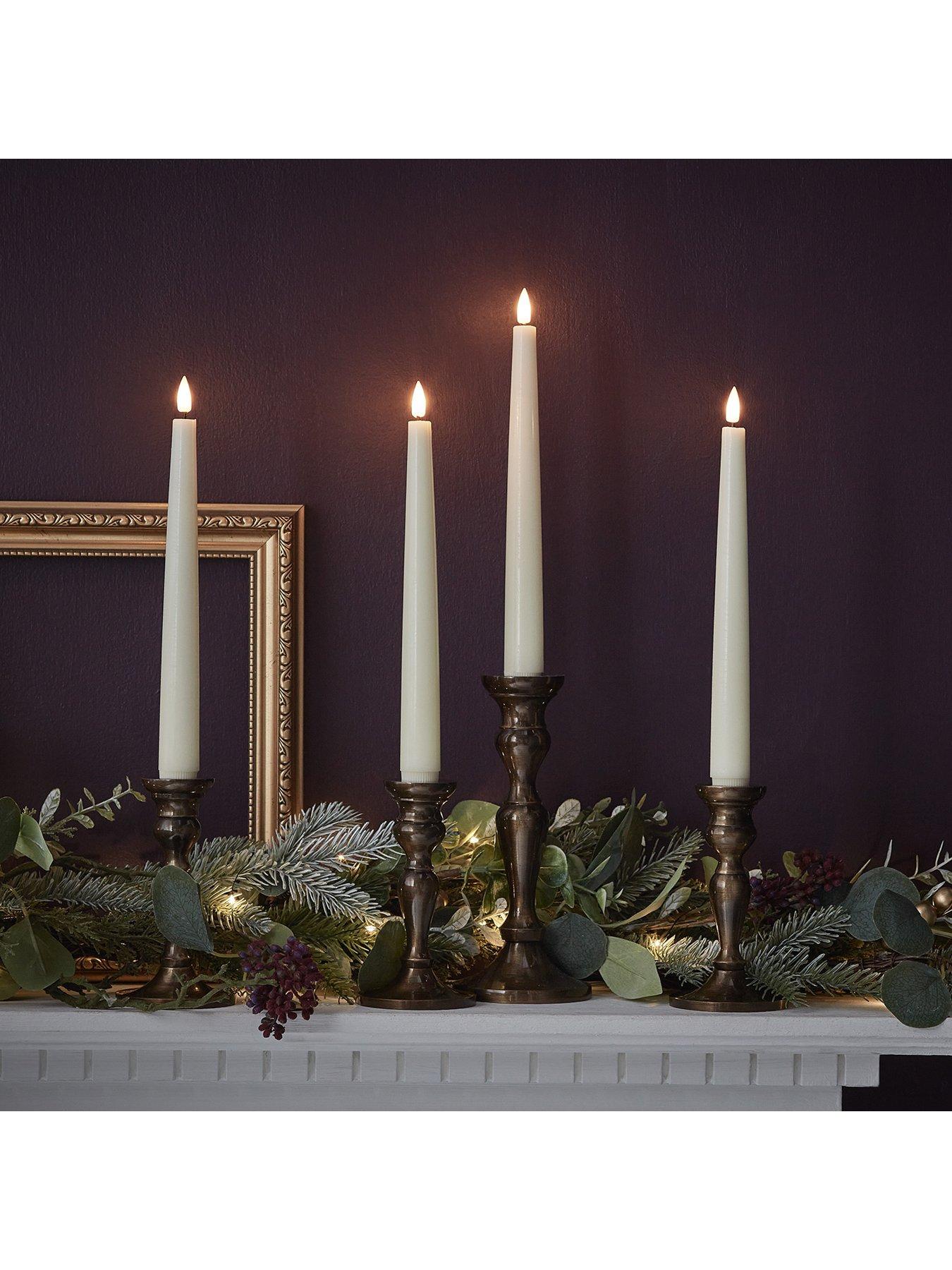  image of lights4fun-8-truglow-ivory-led-taper-candles-with-remote-control