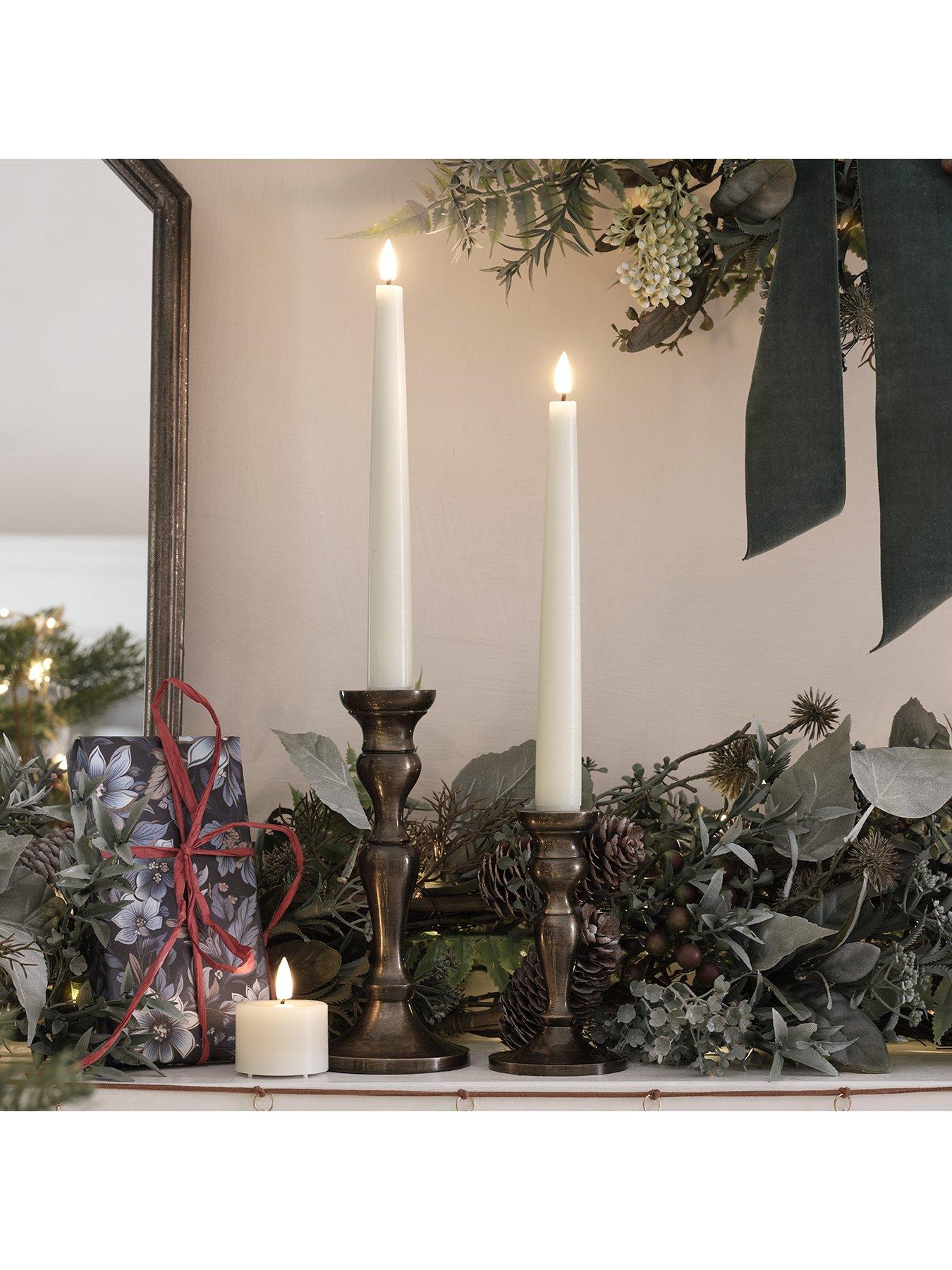  image of lights4fun-8-truglow-ivory-led-taper-candles-with-remote-control