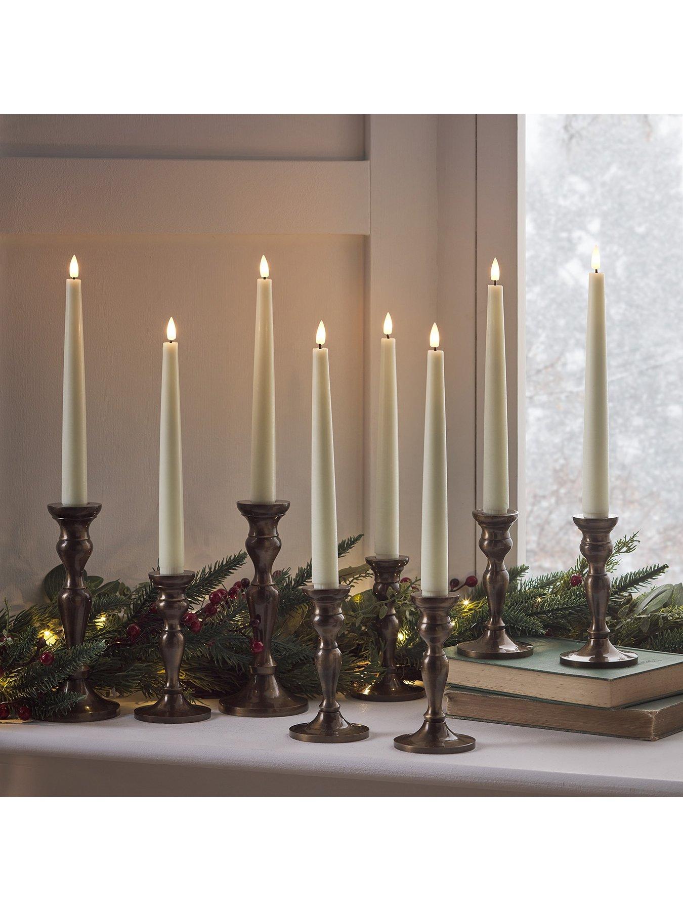  image of lights4fun-8-truglow-ivory-led-taper-candles-with-remote-control