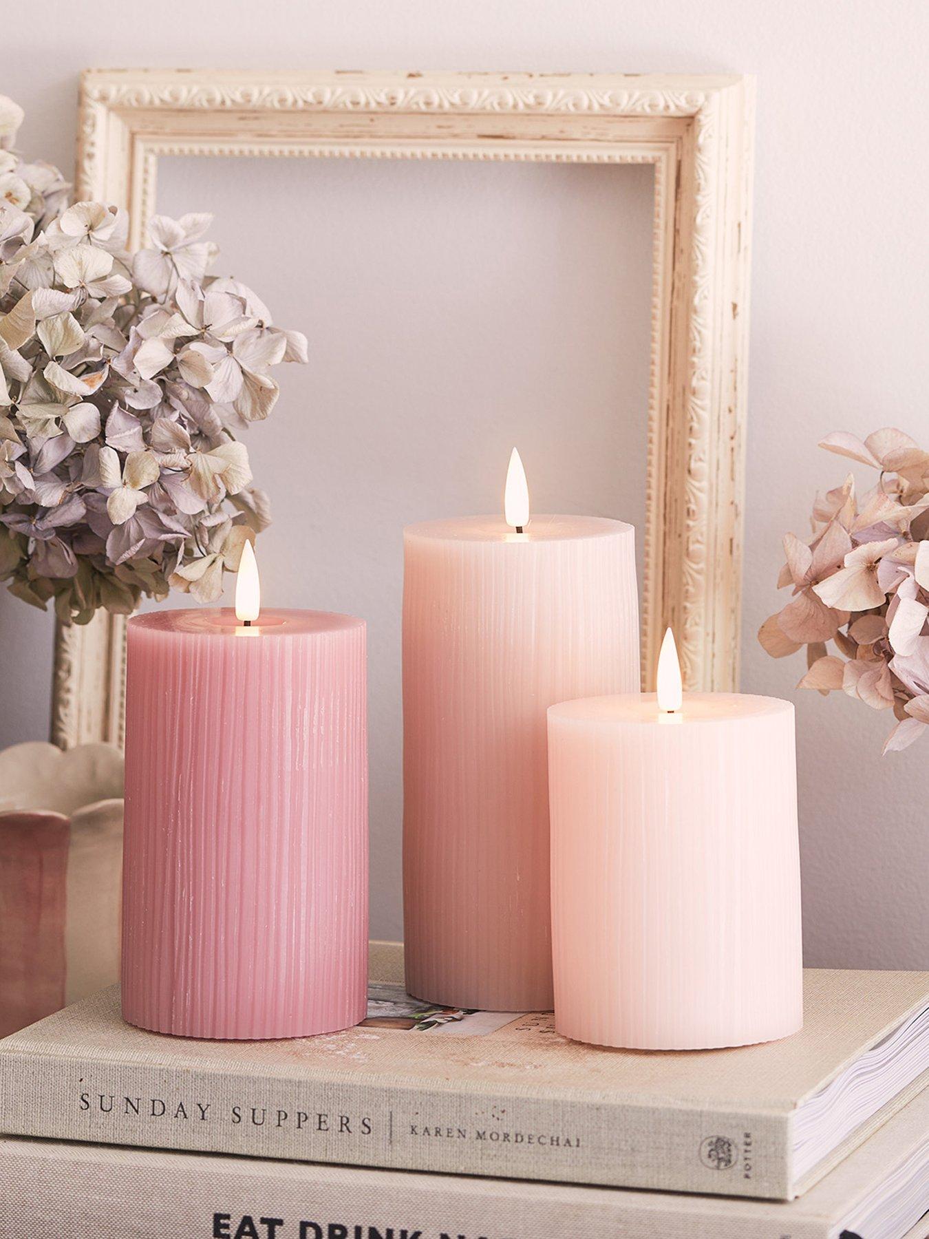Image 1 of 7 of Lights4Fun TruGlow Blush Pink Ribbed LED Pillar Candle Trio