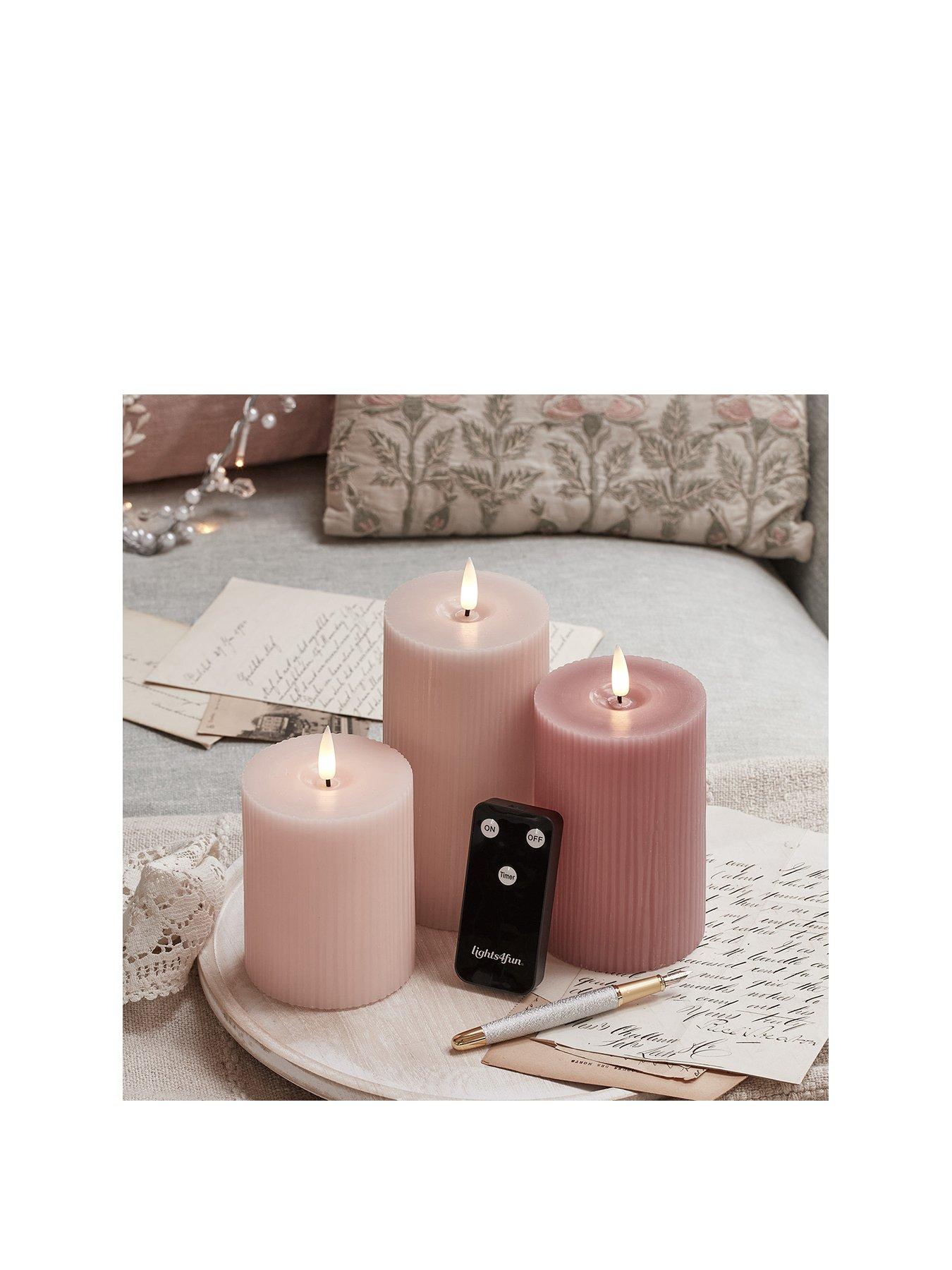 Image 2 of 7 of Lights4Fun TruGlow Blush Pink Ribbed LED Pillar Candle Trio