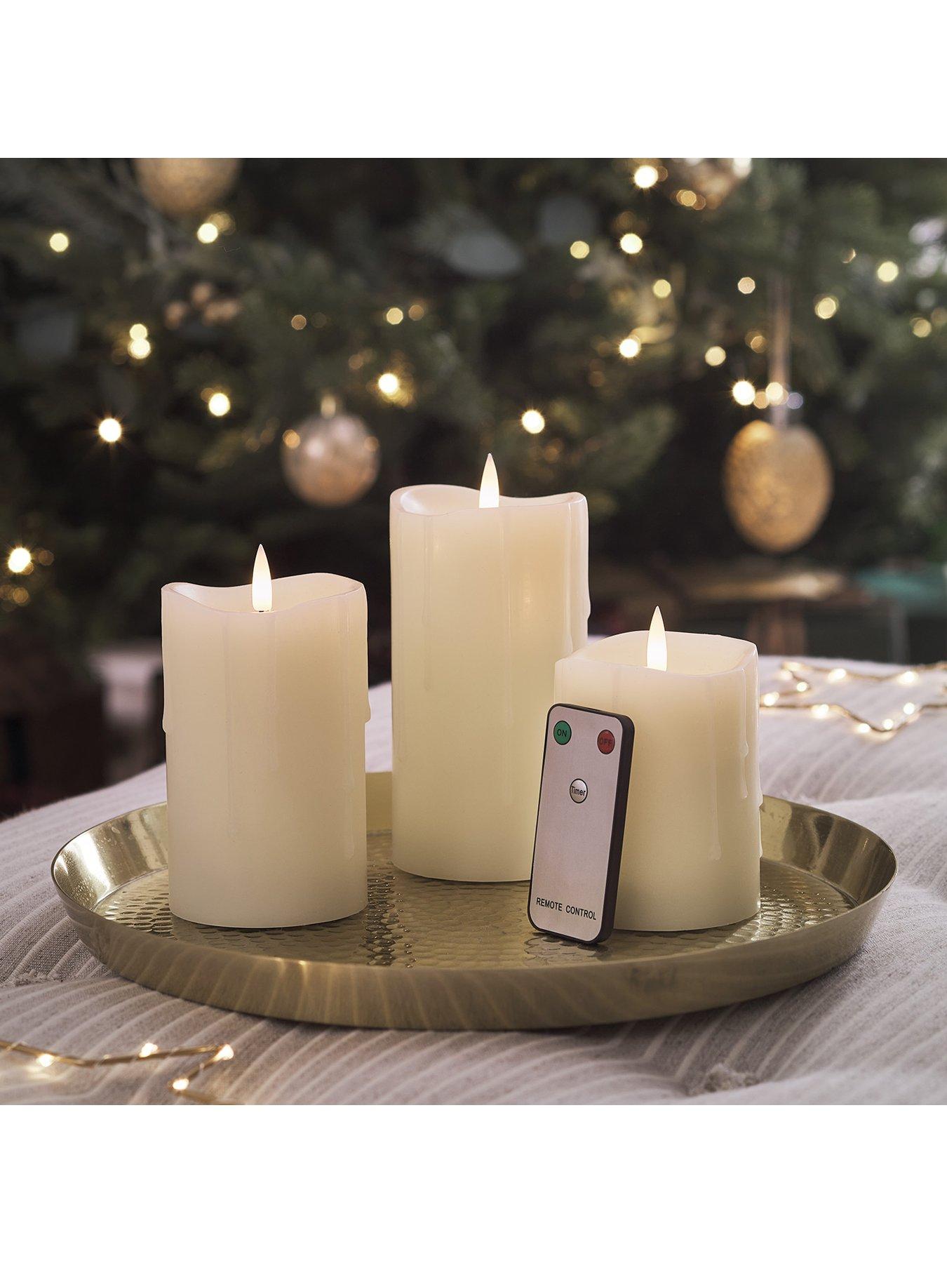  image of lights4fun-truglow-dripping-wax-led-pillar-candle-trio