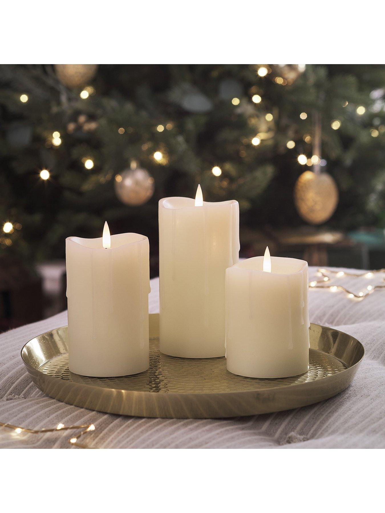  image of lights4fun-truglow-dripping-wax-led-pillar-candle-trio