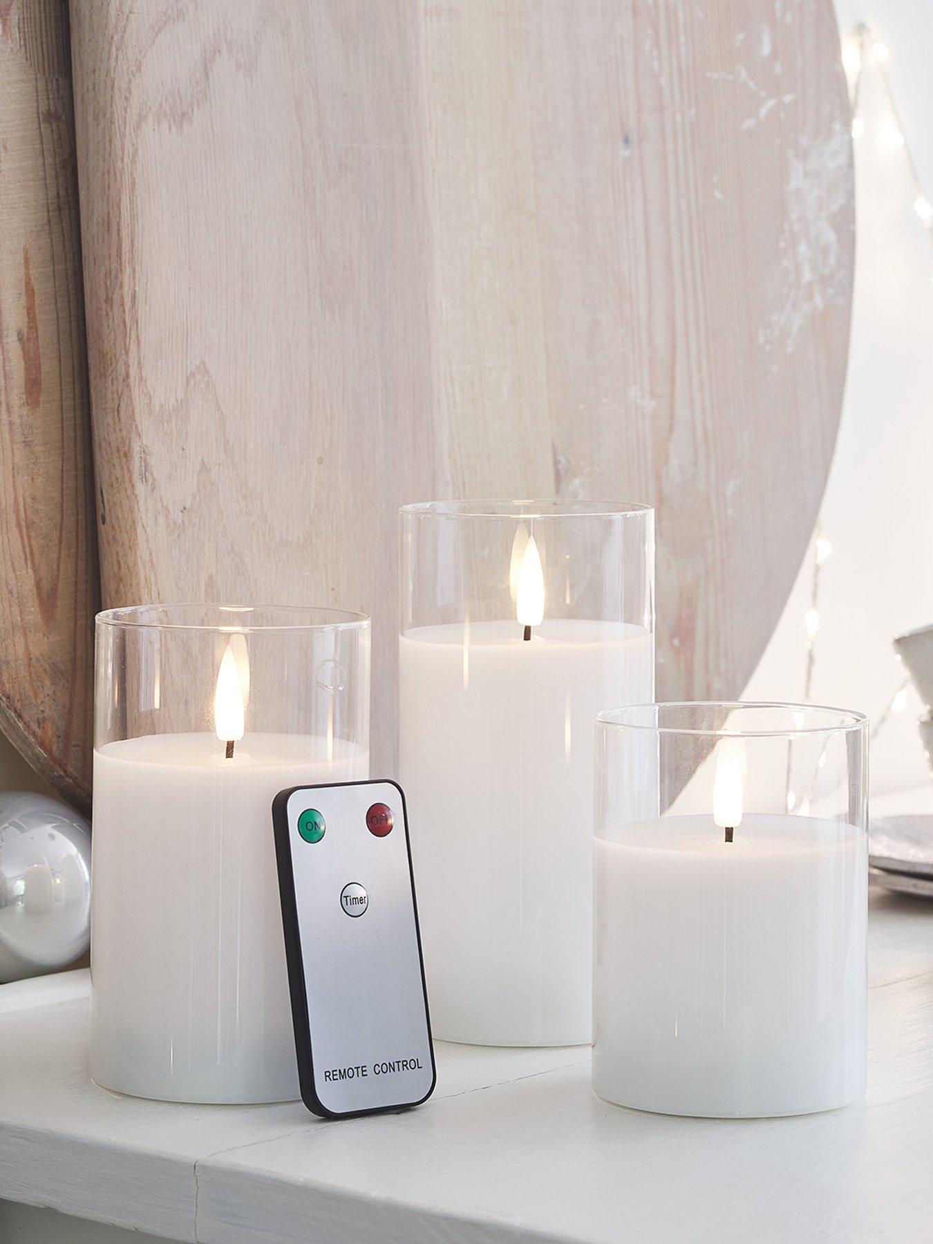  image of lights4fun-truglow-white-led-glass-candle-trio-with-remote-control
