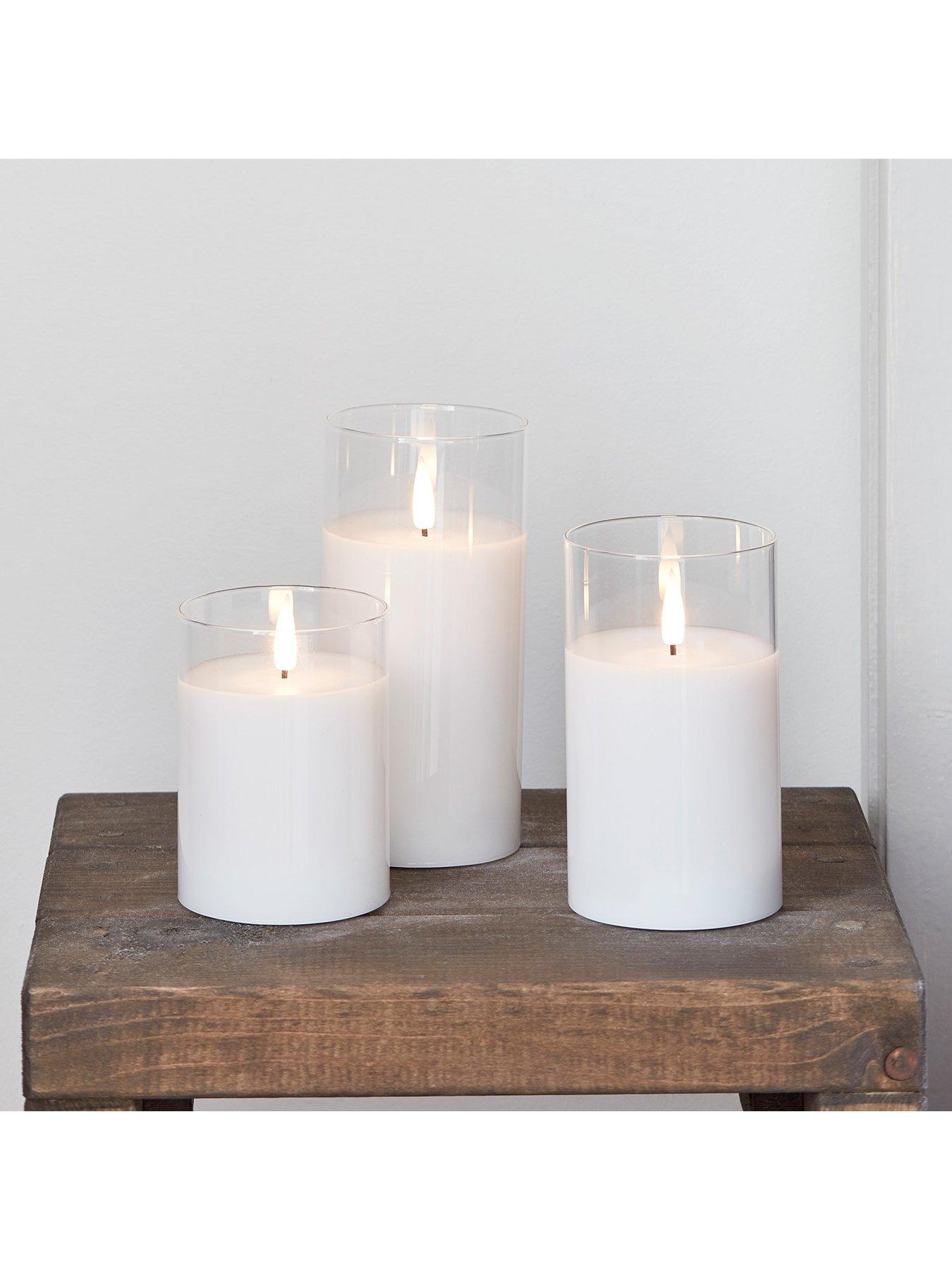  image of lights4fun-truglow-white-led-glass-candle-trio-with-remote-control
