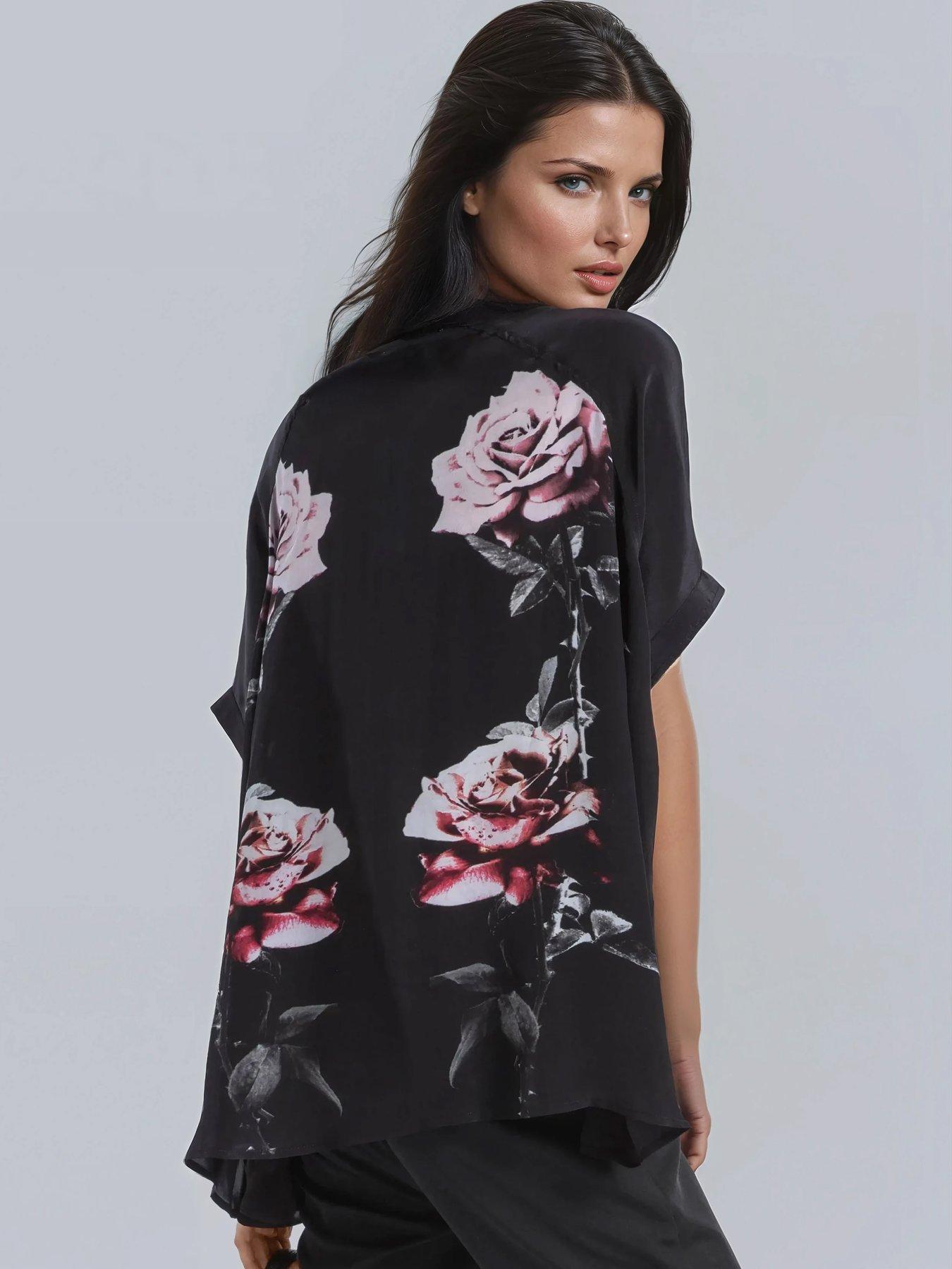  image of religion-loose-rose-heart-tie-neck-floral-back-placement-blouse-black