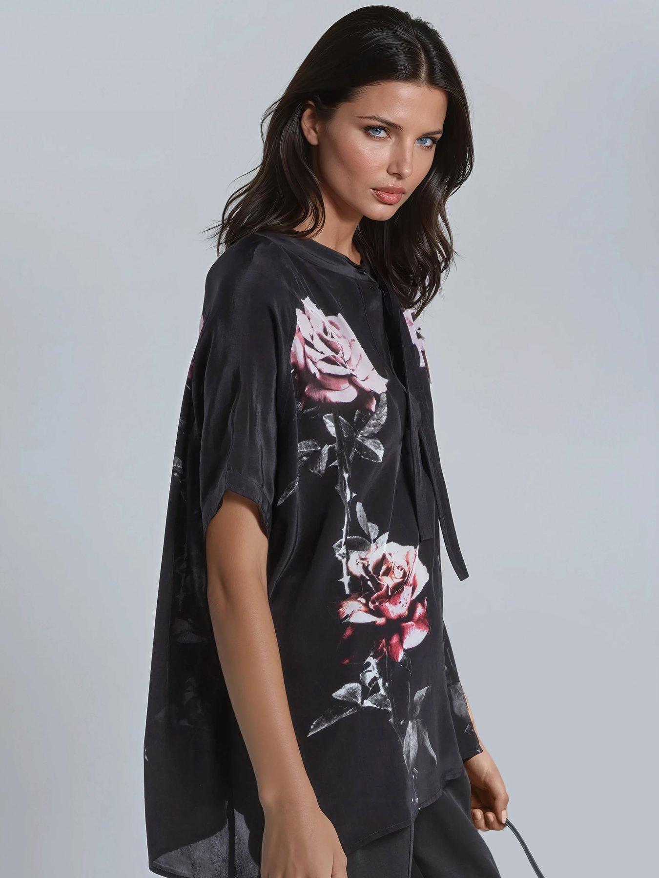  image of religion-loose-rose-heart-tie-neck-floral-back-placement-blouse-black