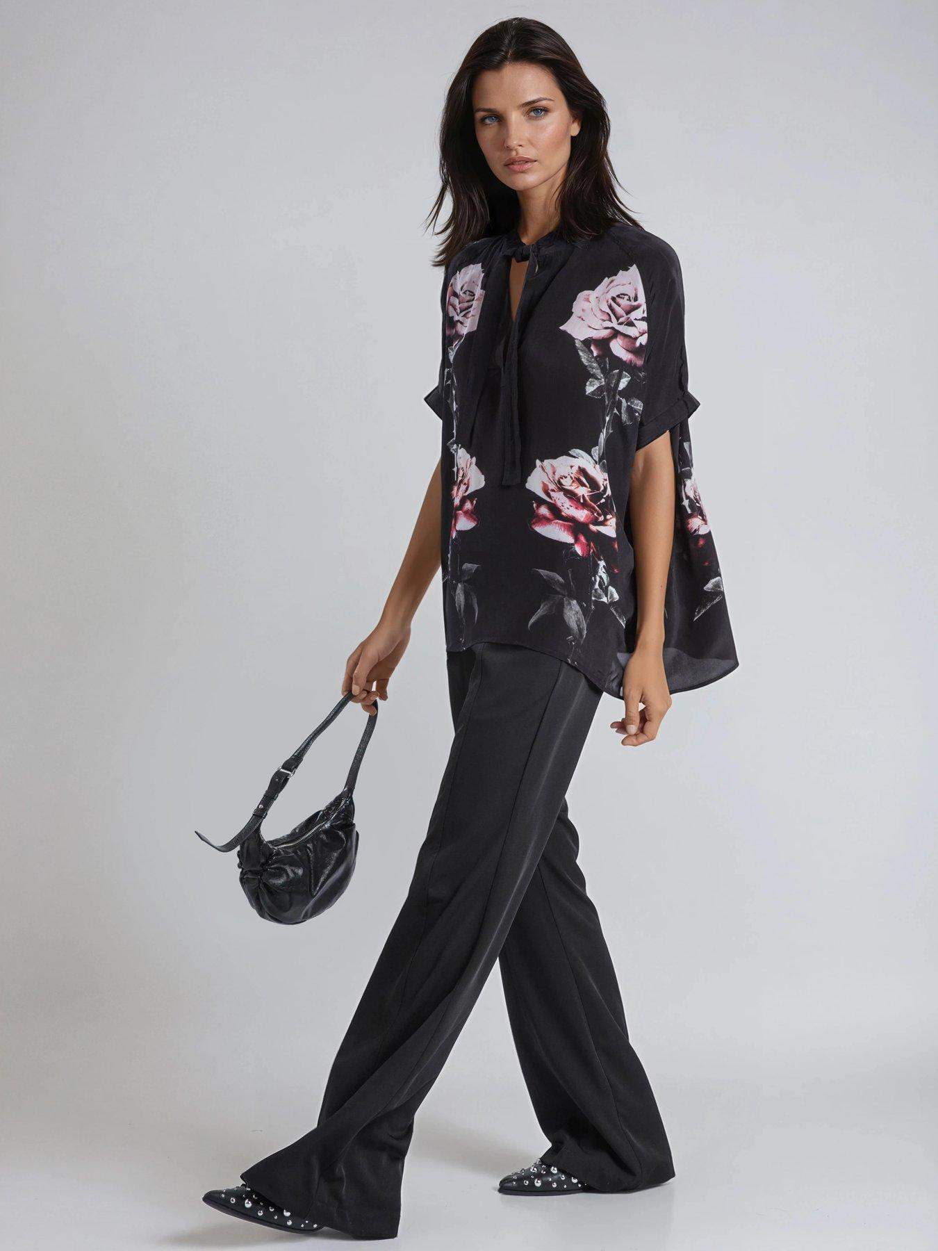  image of religion-loose-rose-heart-tie-neck-floral-back-placement-blouse-black