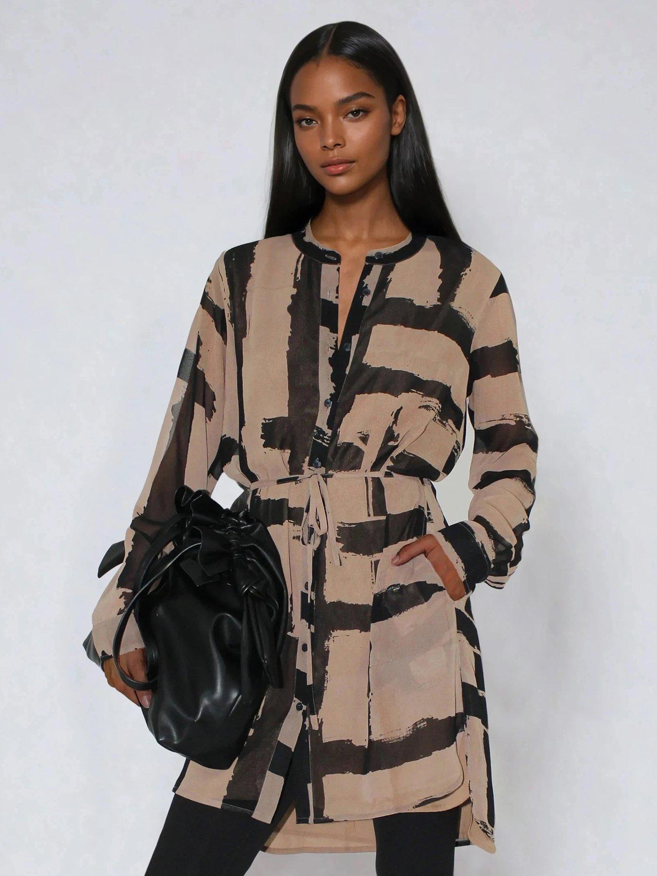 front image of religion-zoe-abstract-stripe-long-line-tunic-dress-brown