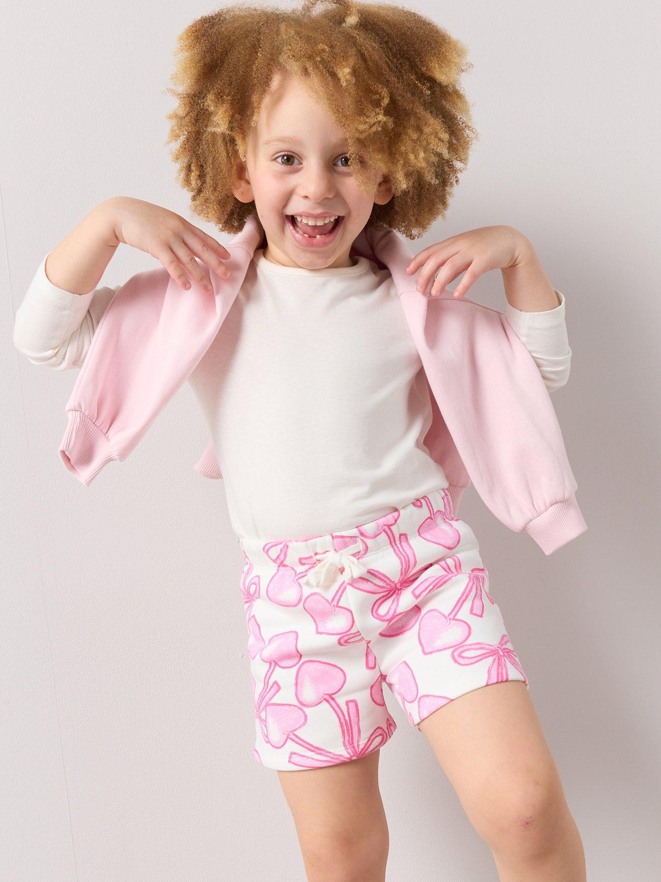Image 1 of 5 of The Very Collection Girls Co-Ord Printed Sweat Shorts - Cream/Pink