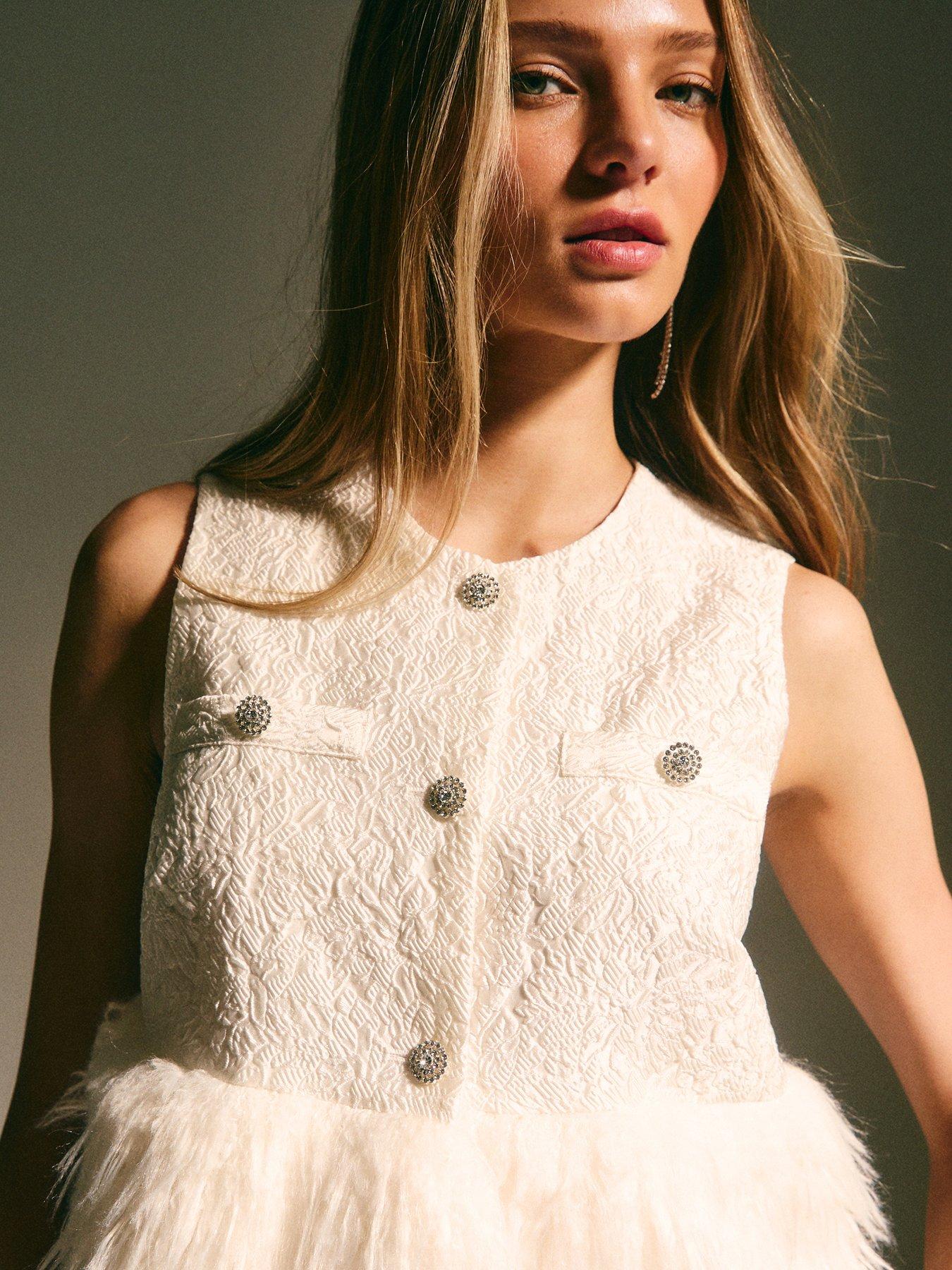  image of new-look-faux-fur-hem-sleeveless-waistcoat-top-beige