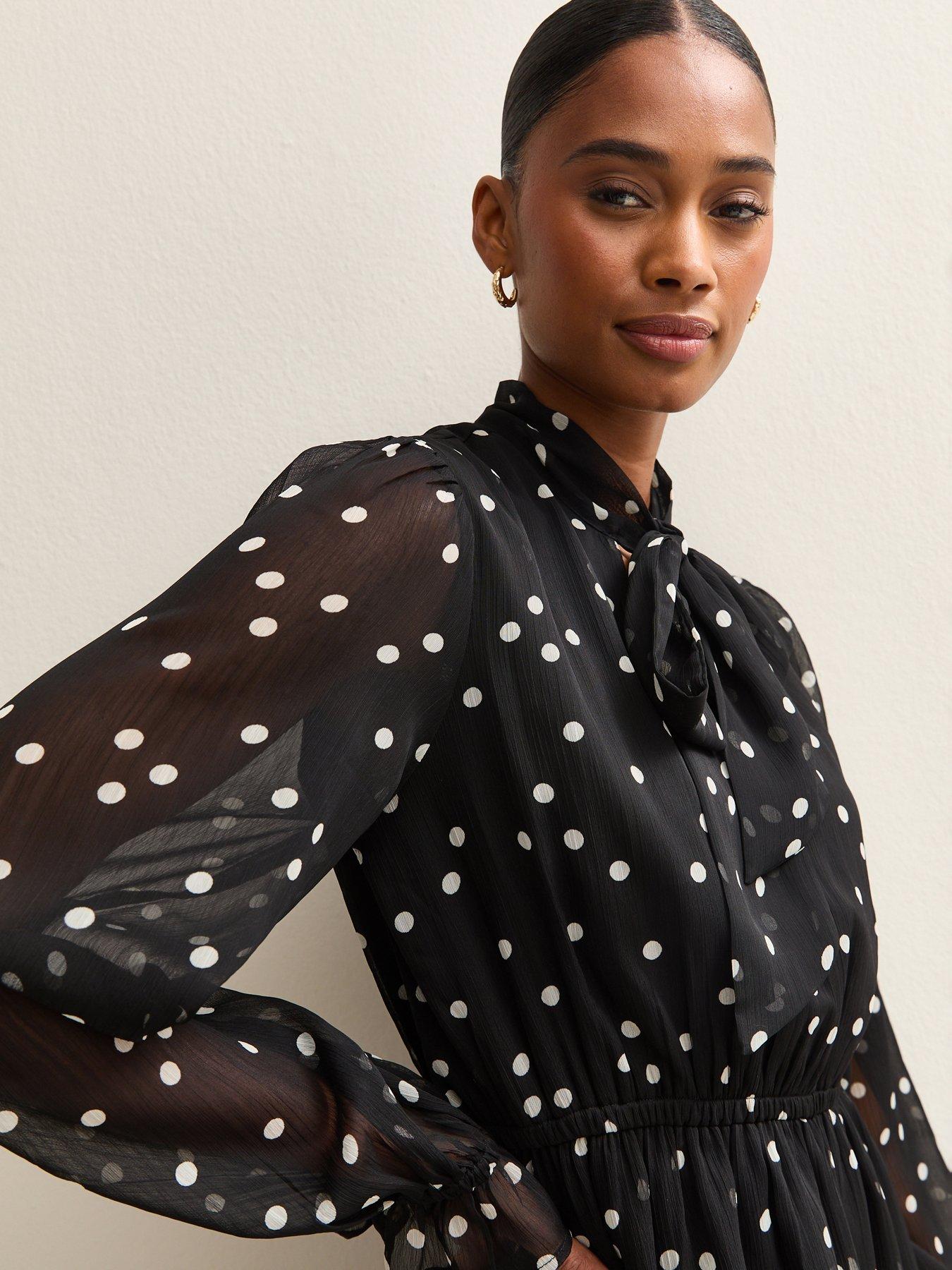 Image 4 of 5 of New Look Black Polka Dot Pussybow Mini Dress